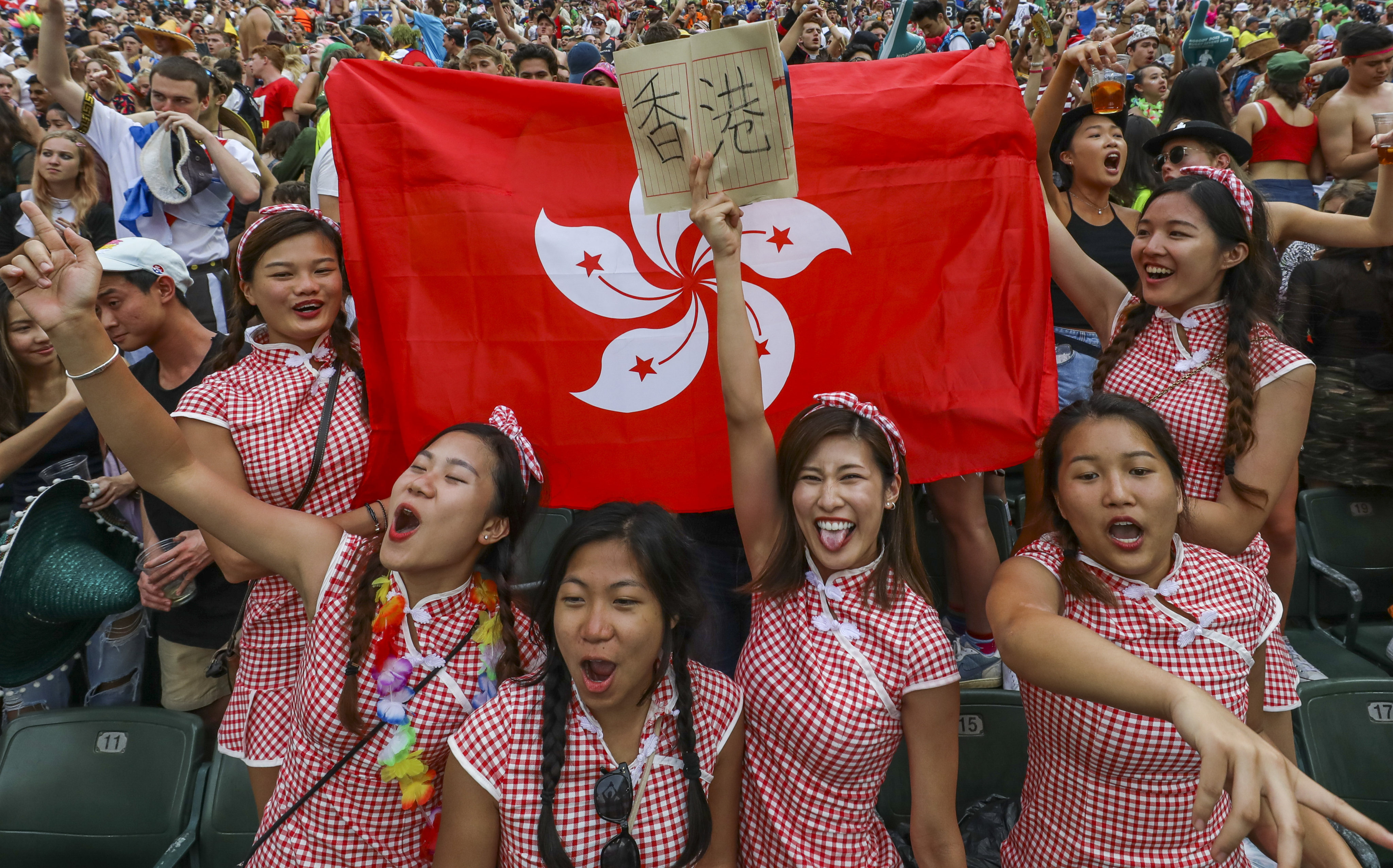 Fans in the South Stand cheer on Hong Kong during the second day of the 2019 Hong Kong Sevens at Hong Kong Stadium. Photo: Sam Tsang