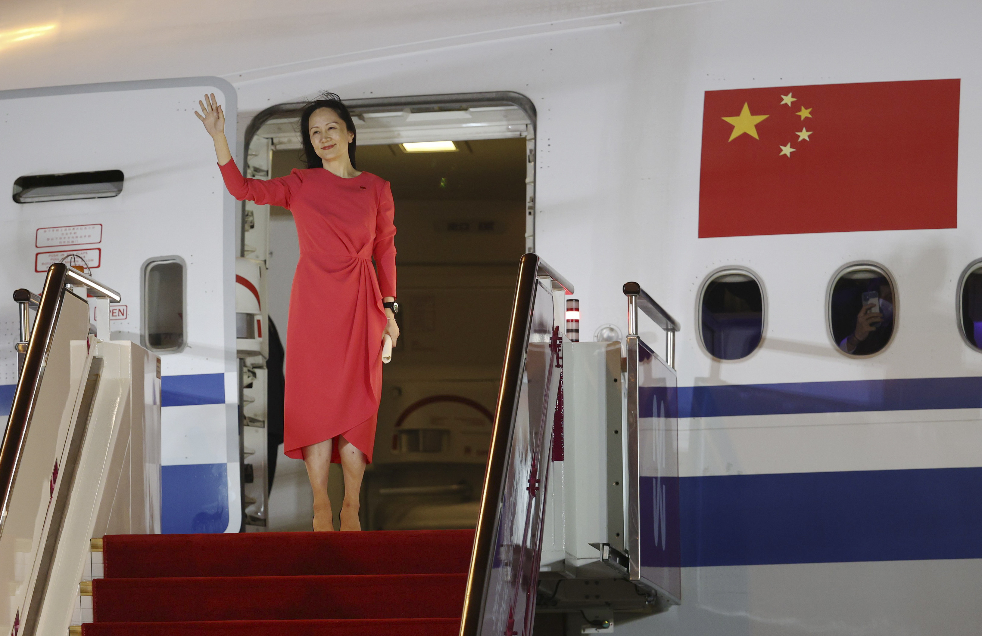 Huawei executive Meng Wanzhou waves as she arrives at Shenzhen Baoan International Airport on September 25, 2021, after almost three years fighting US extradition charges from Vancouver. In recent years, China’s international image and appeal have deteriorated, to the detriment of Chinese people and companies abroad. Photo: Xinhua