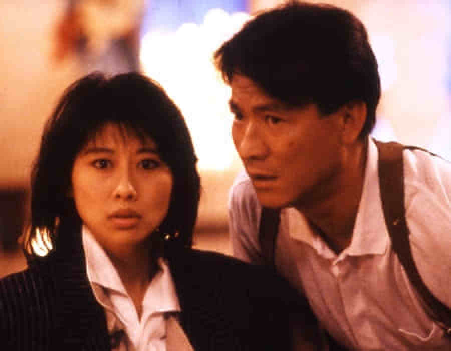 Sally Yeh as Jennie the nightclub singer and Danny Lee as Detective Li Ying in a still from The Killer.