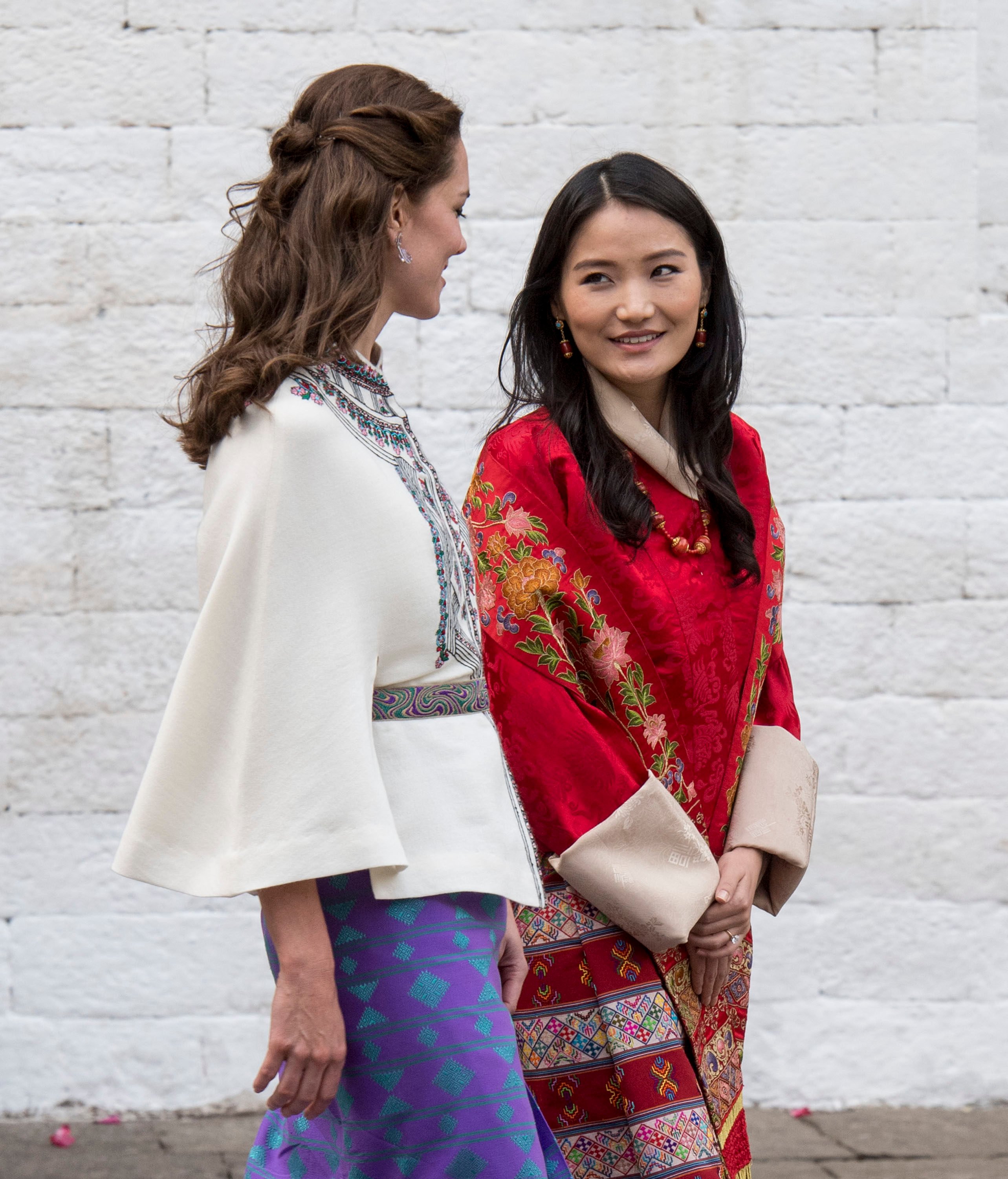 Queen Jetsun Pema and Catherine, Duchess of Cambridge after a ceremonial welcome and audience at Taschichho Dzong in April 2016, in Thimphu, Bhutan. Photo: Getty Images