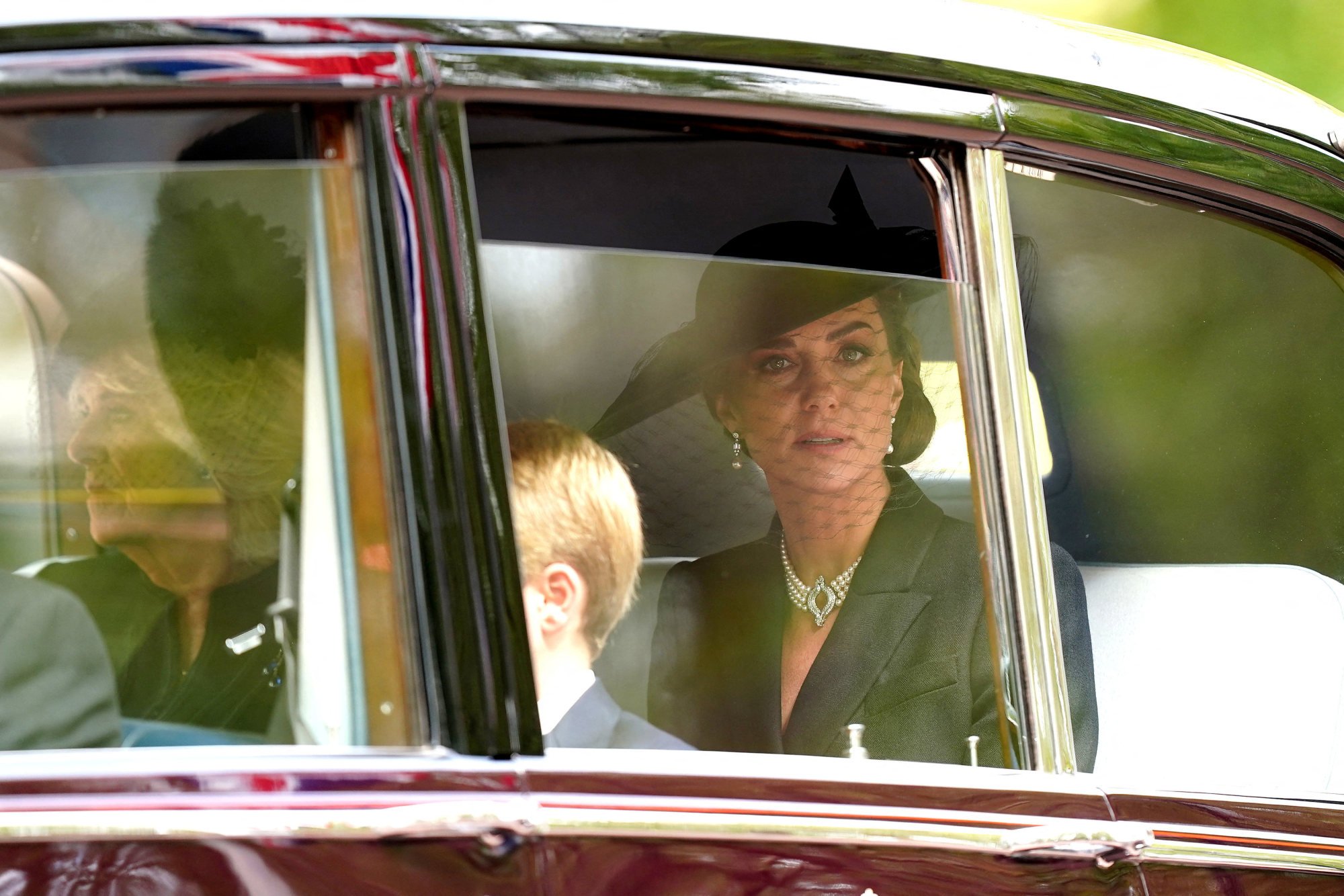 Catherine, the Princess of Wales, Prince George and Camilla, the queen consort follow the state gun carriage carrying the coffin of Queen Elizabeth, on September 19. Photo: Reuters