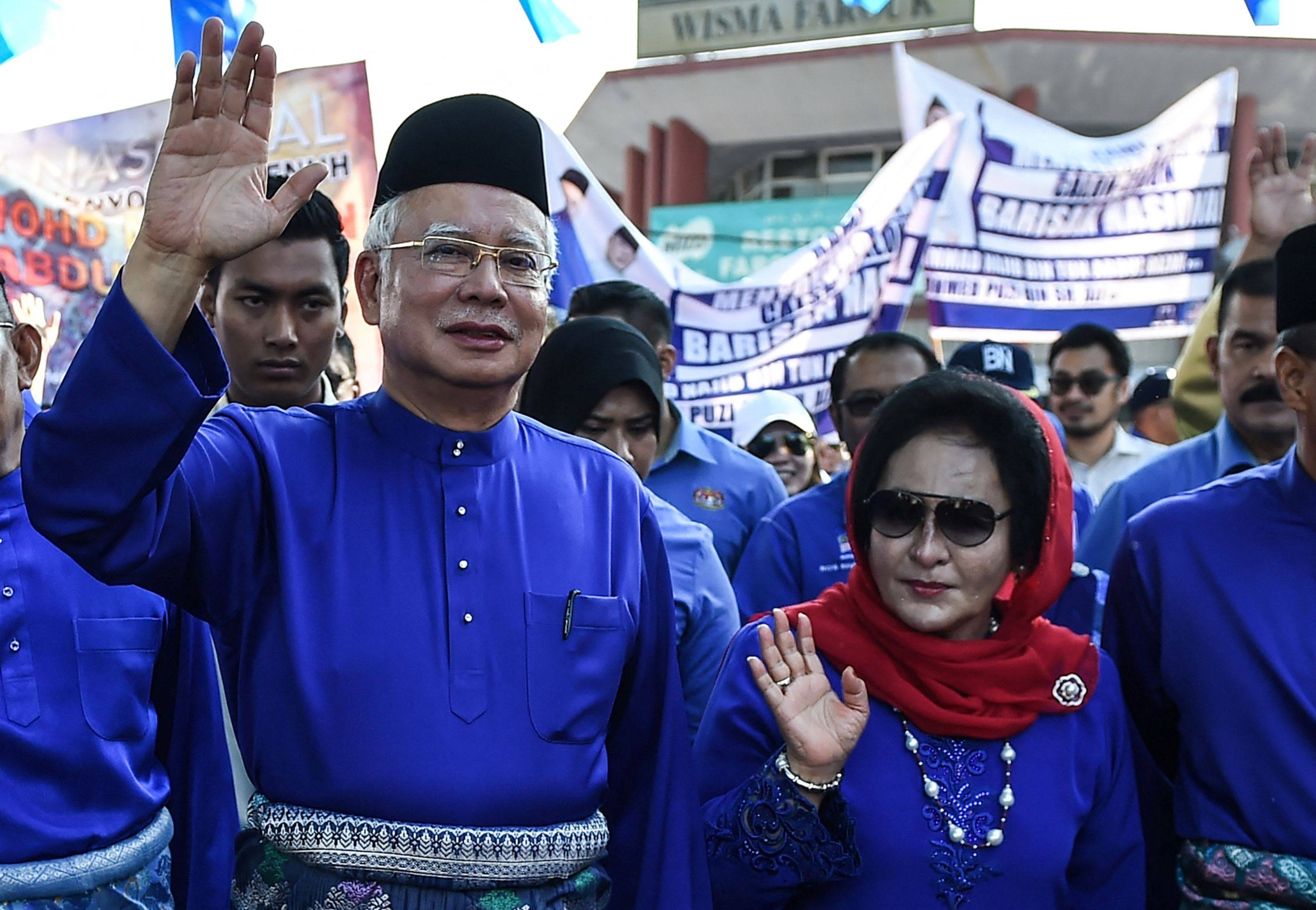 Malaysia’s then-Prime Minister Najib Razak and his wife Rosmah Mansor wave to supporters in 2018. Photo: AFP