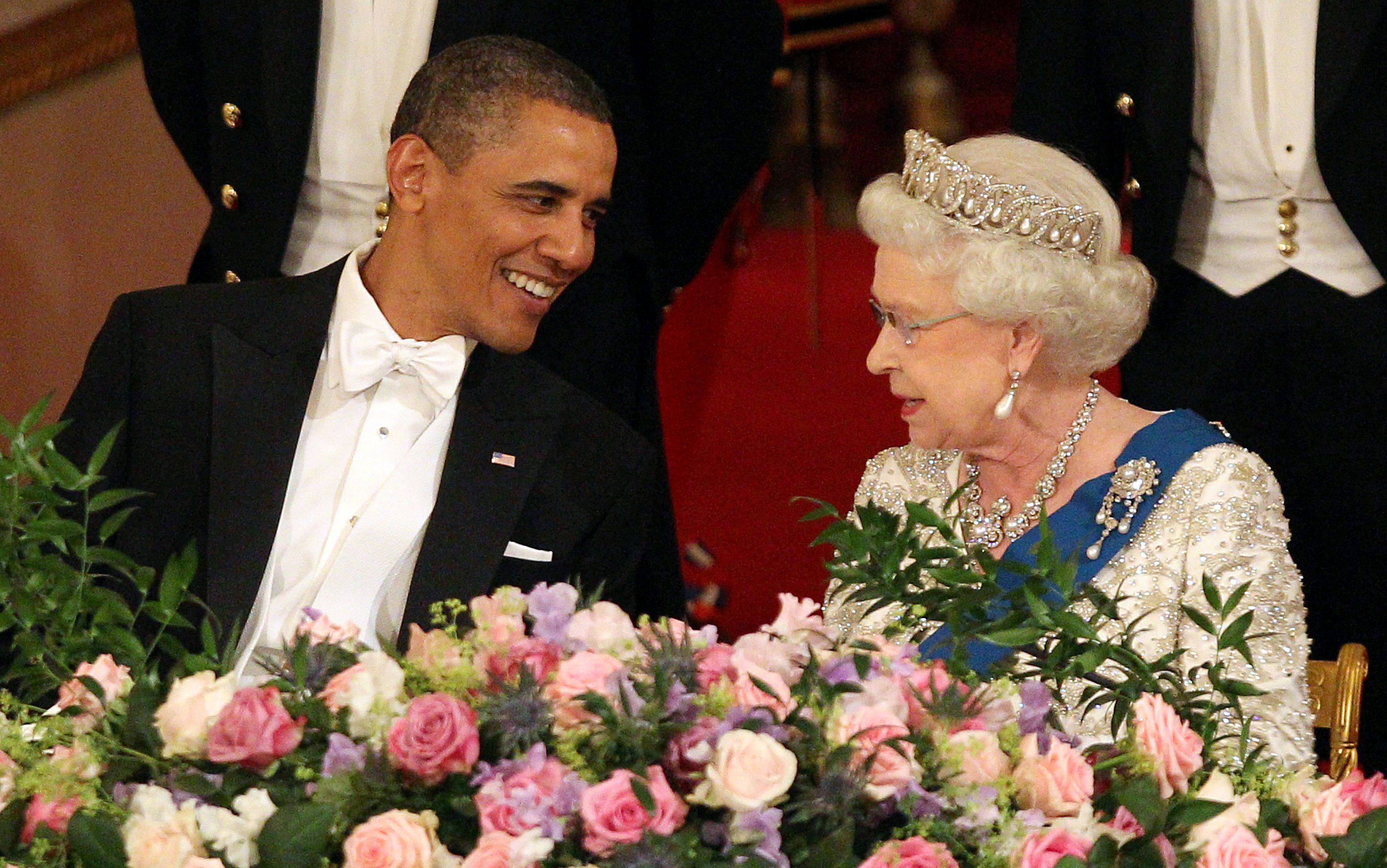 (FILES) In this file photo taken on May 24, 2011 US President Barack Obama speaks with Britain’s Queen Elizabeth II during a state banquet at Buckingham Palace, in central London. - From a string of US presidents to Lady Gaga, Queen Elizabeth II met leading political and artistic personalities from around the globe during her record-breaking time on the throne. Some were despised dictators, others world-famous guitarists she made polite conversation with. Regardless of the personalities, she always kept her composure. (Photo by LEWIS WHYLD / POOL / AFP)