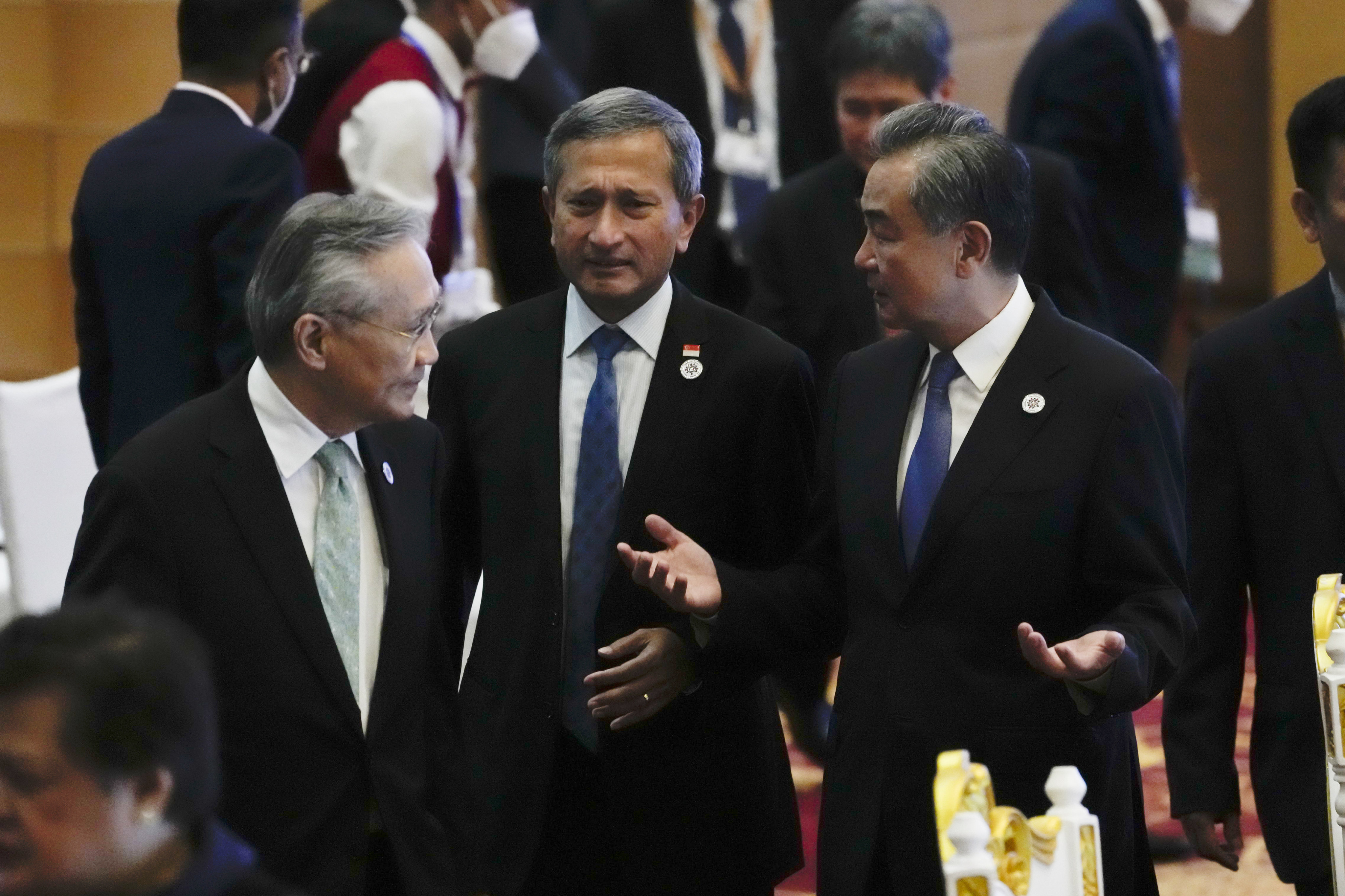 Chinese Foreign Minister Wang Yi (right) chats with Singapore’s Foreign Minister Vivian Balakrishnan (centre) and Thailand’s Foreign Minister Don Pramudwinai at the Asean-China Ministerial Meeting in Phnom Penh, Cambodia in August 2022. Photo: AP