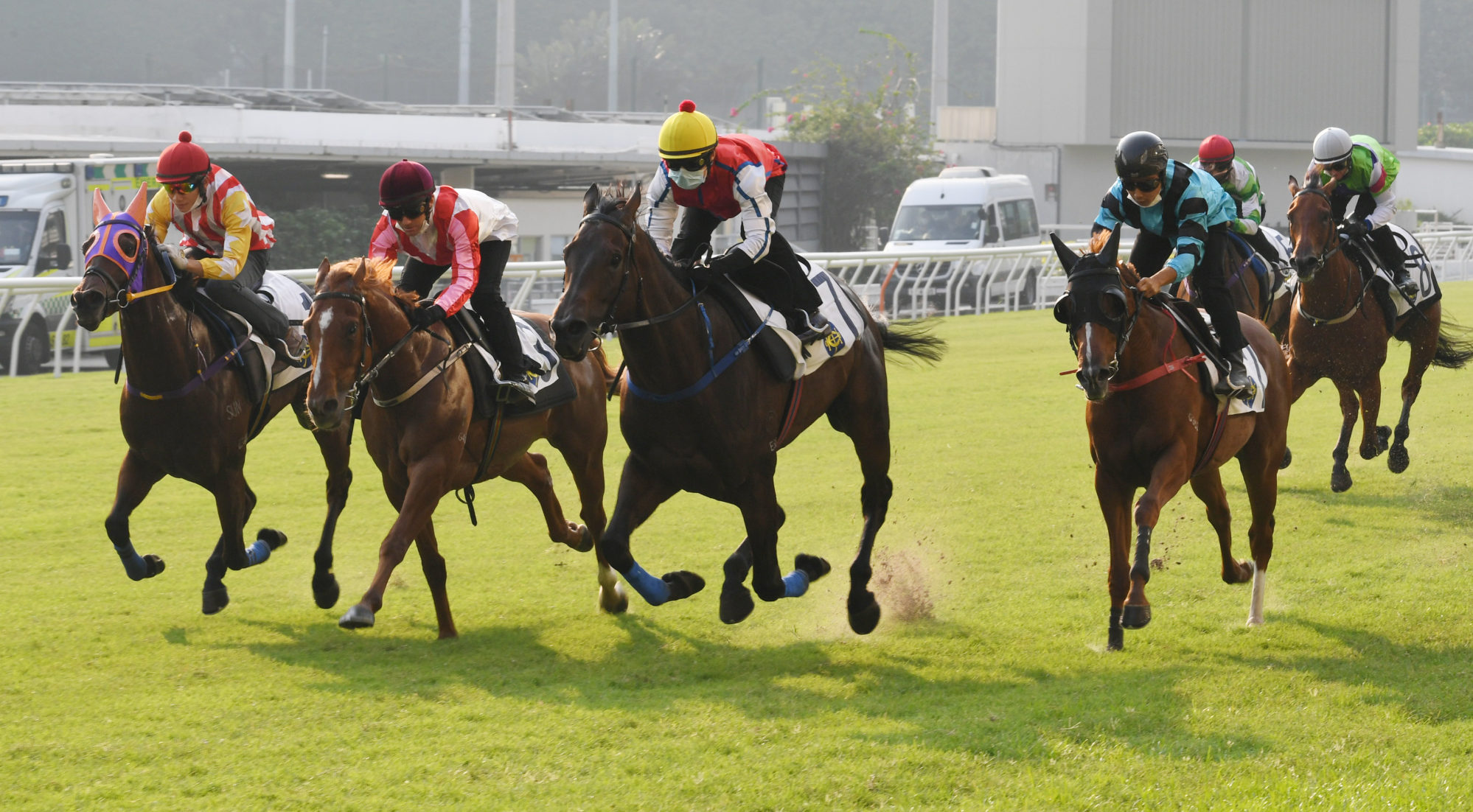 Super Eagle (second left) places second behind Gem Of South China (yellow cap) in a Happy Valley barrier trial on September 17.