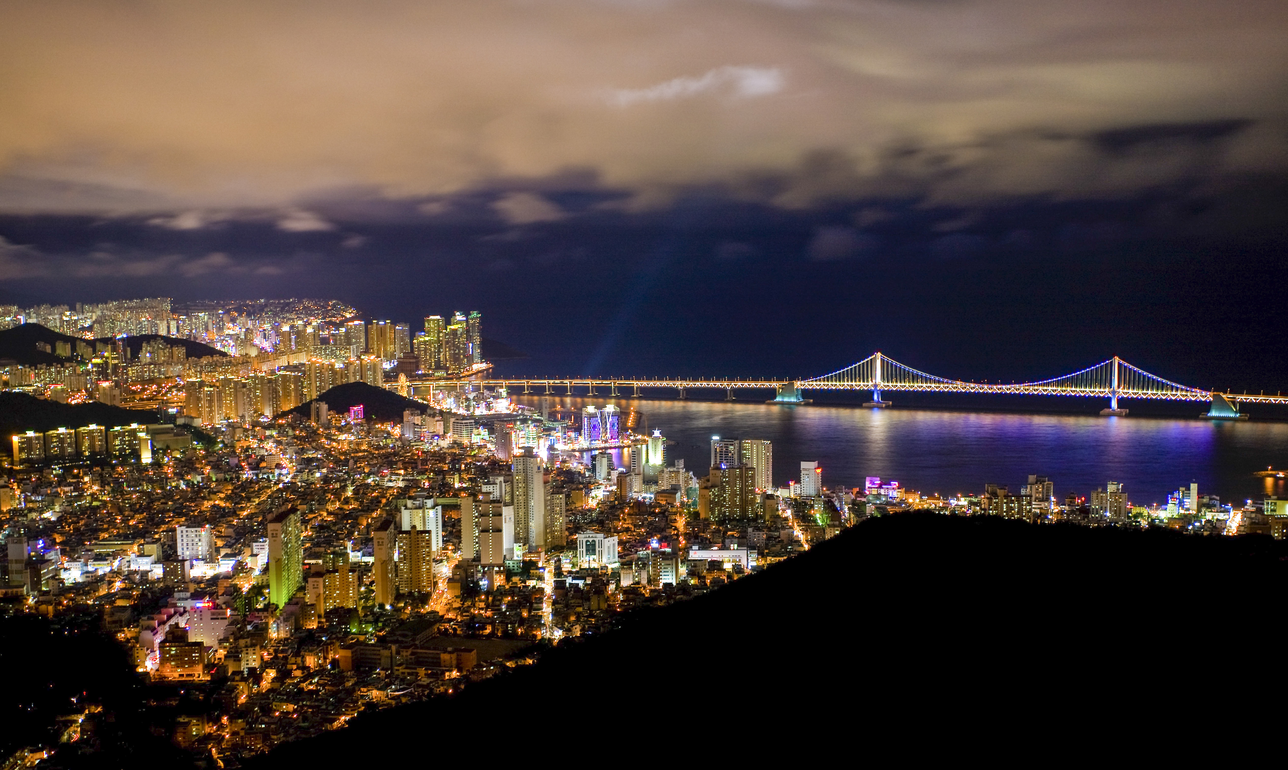 View of the Gwangan Bridge illuminated by thousands of LED lights in Busan, South Korea. Photo: Daniel Allen 