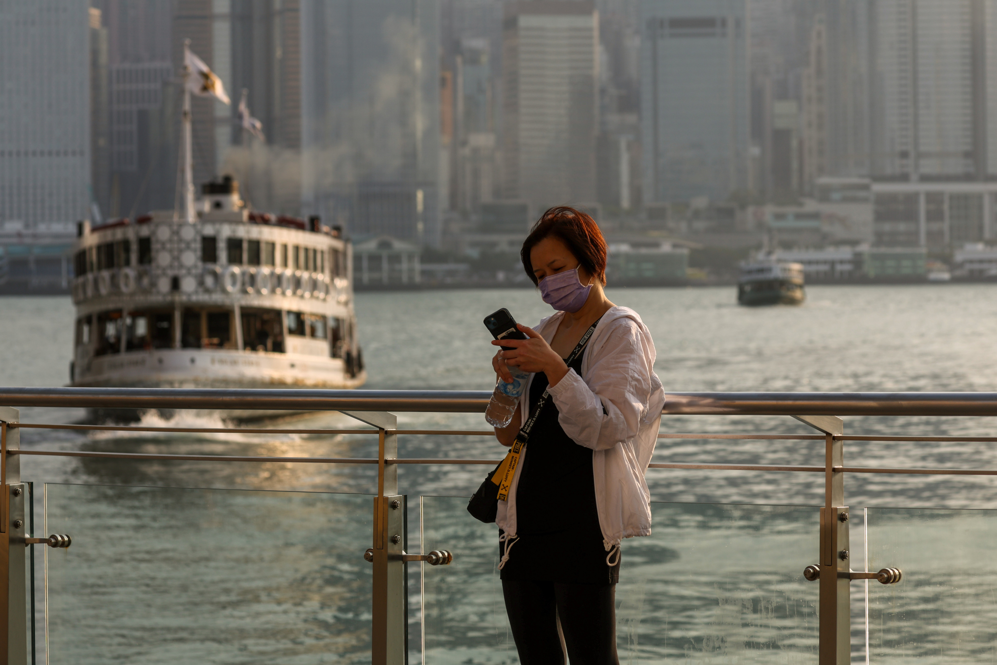 The Tsim Sha Tsui waterfront, an area known for its views of the city skyline, were largely visited by local people on Monday even after border measures were eased. Photo: Edmond So