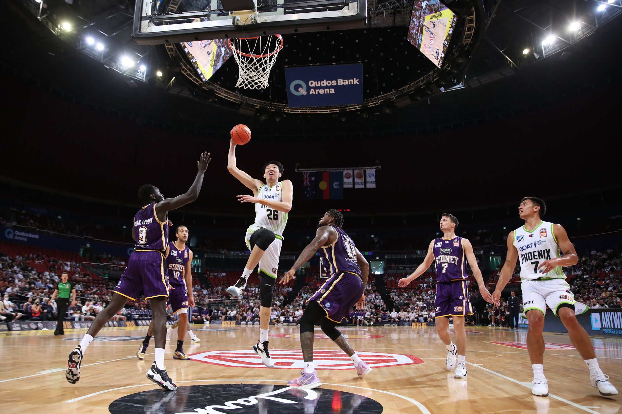 Zhou Qi of the SEM Phoenix slam dunks during an NBL game against Sydney Kings last season. Photo: Getty Images