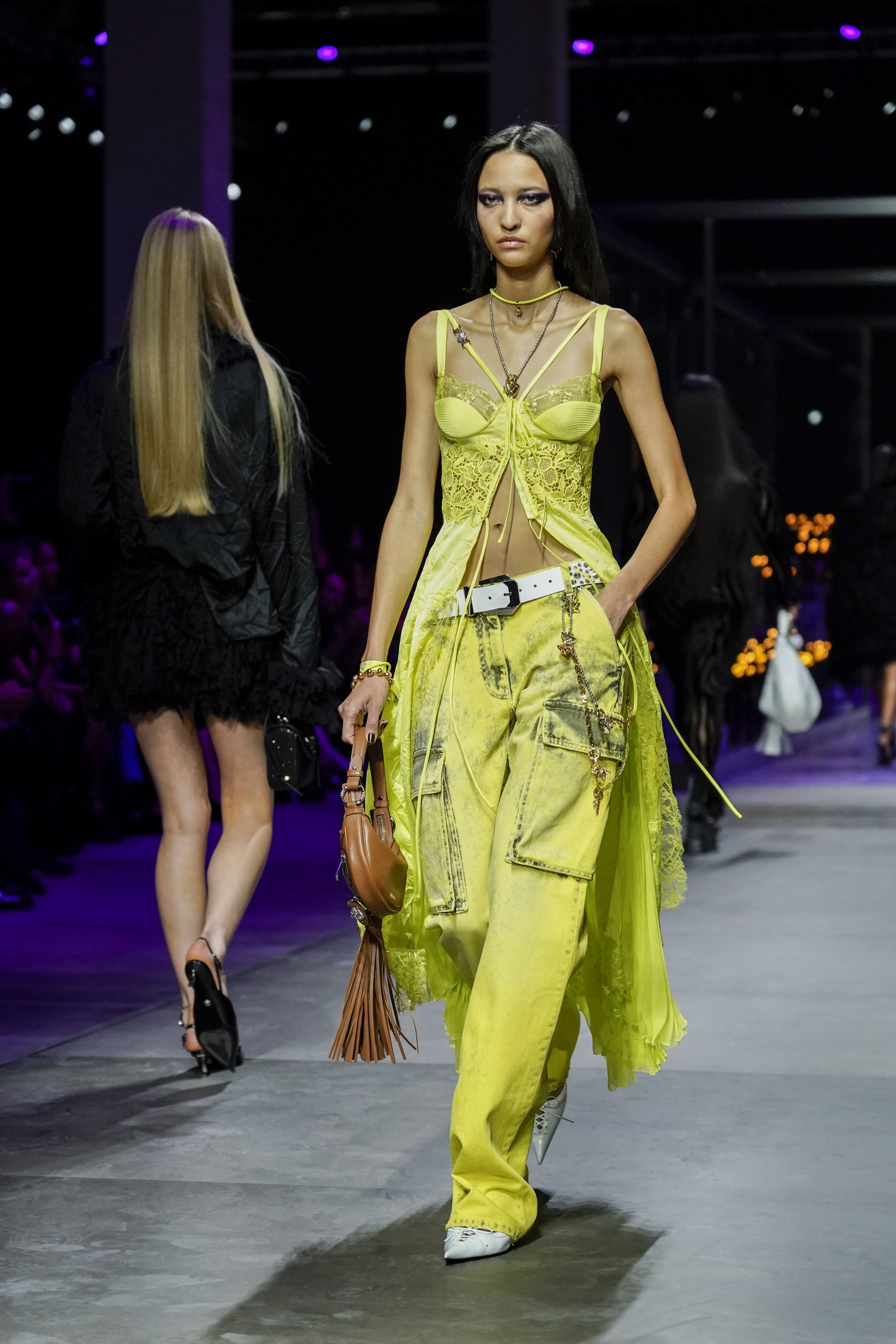 Milan Fashion Week: How Versace married gritty and divine for spring/summer  2023, with Bella Hadid and Paris Hilton strutting in dark and neon bridal  dresses with veils and tiaras