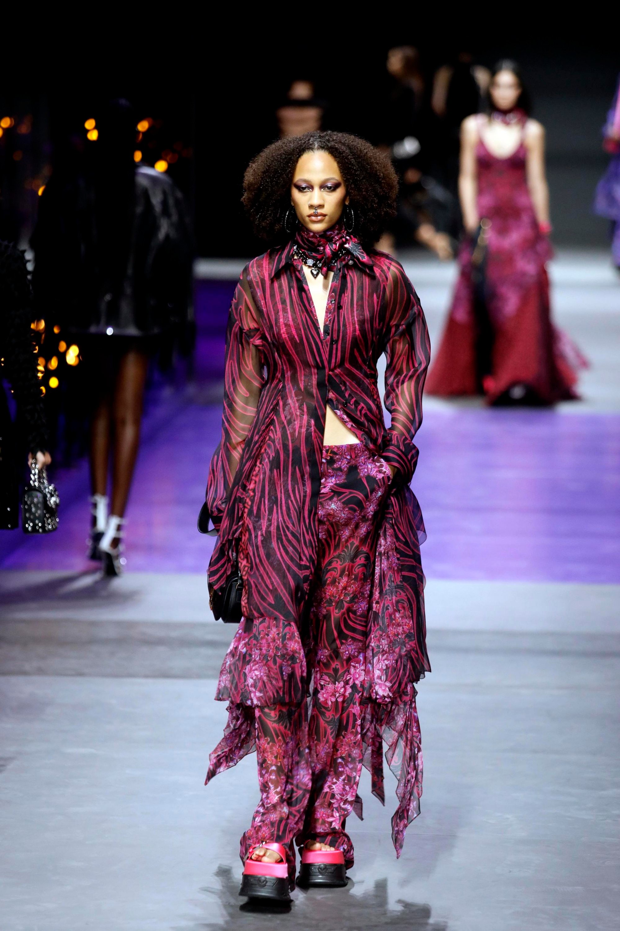 A model walks on the runway at the Versace fashion show during the Spring  Summer 2023 Collections Fashion Show at Milan Fashion Week in Milano on  September 23 2022. (Photo by Jonas