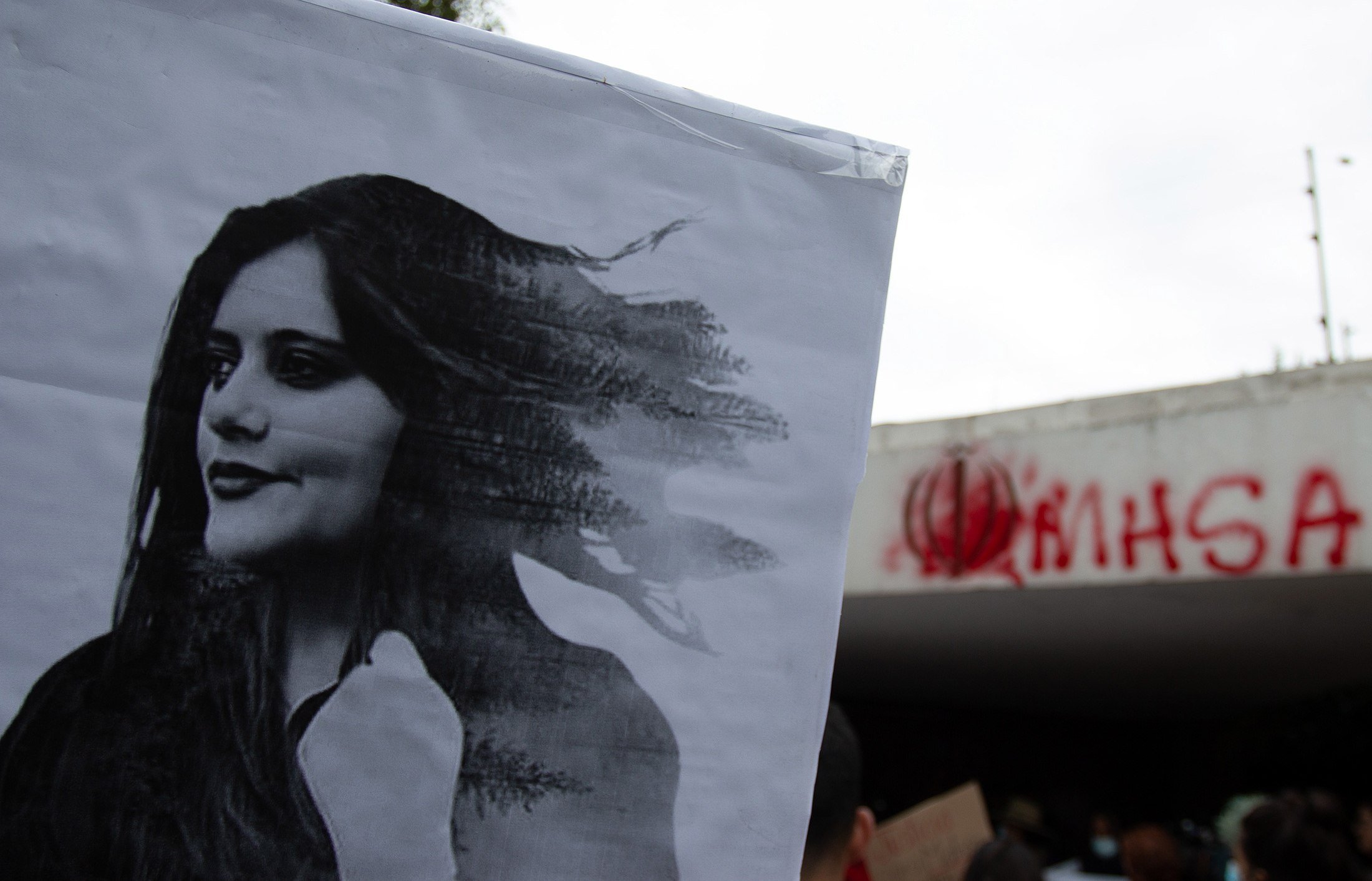 A demonstrator holds a poster during a protest demanding justice for Mahsa Amini, a 22-year-old Iranian woman who died while in the custody of Iran’s Guidance Patrol, in front of the Iranian embassy in Mexico City, Mexico, on September 27.  Photo: EPA-EFE