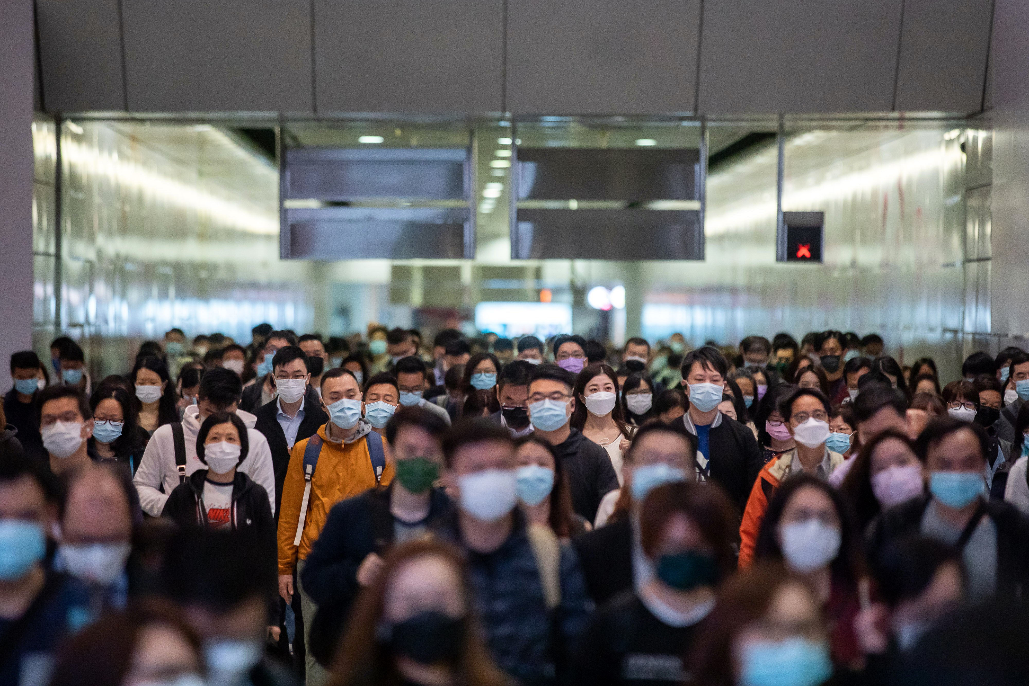 Commuters in Hong Kong’s Central district on January 27, 2022. Photo: Bloomberg