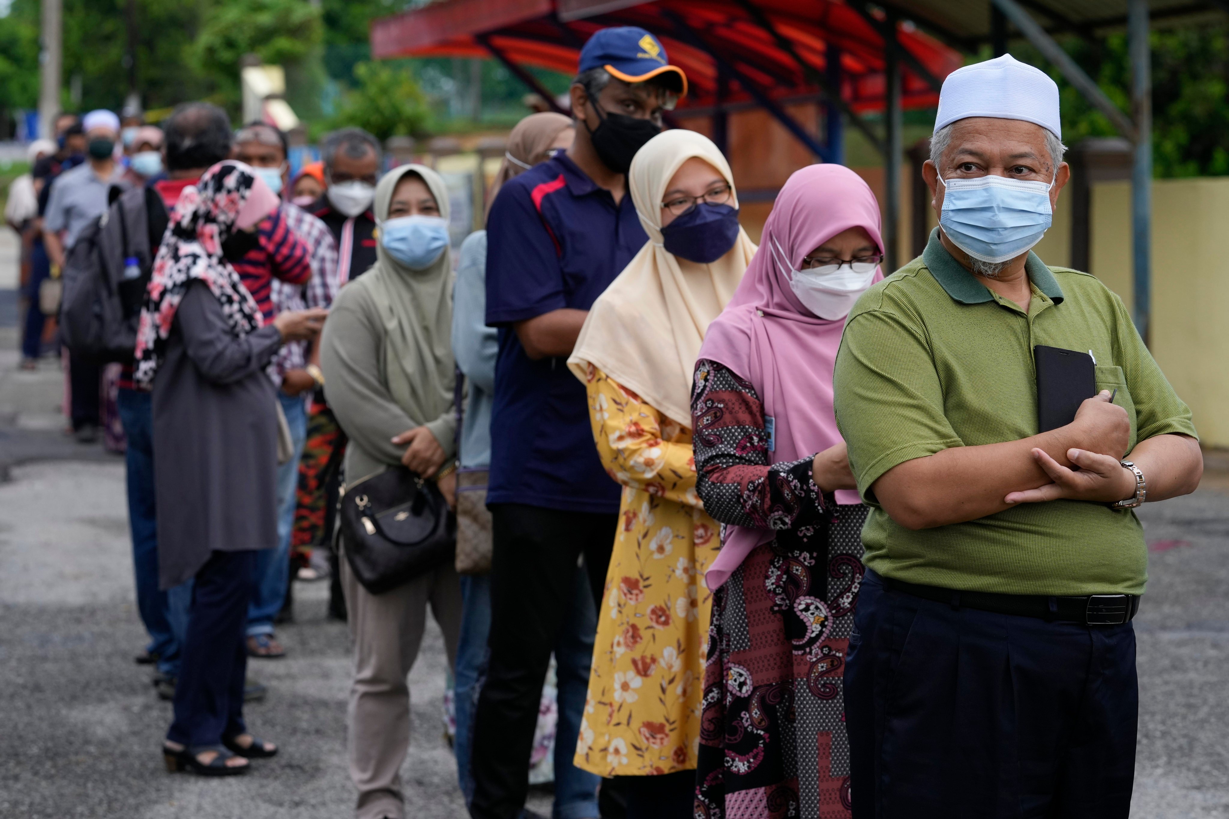 Voters at a voting centre on the outskirts of Malacca, Malaysia in November 2021. 
The crackdowns appear to be escalating as the country inches closer to national polls that need to be called by September 2023. Photo: AP