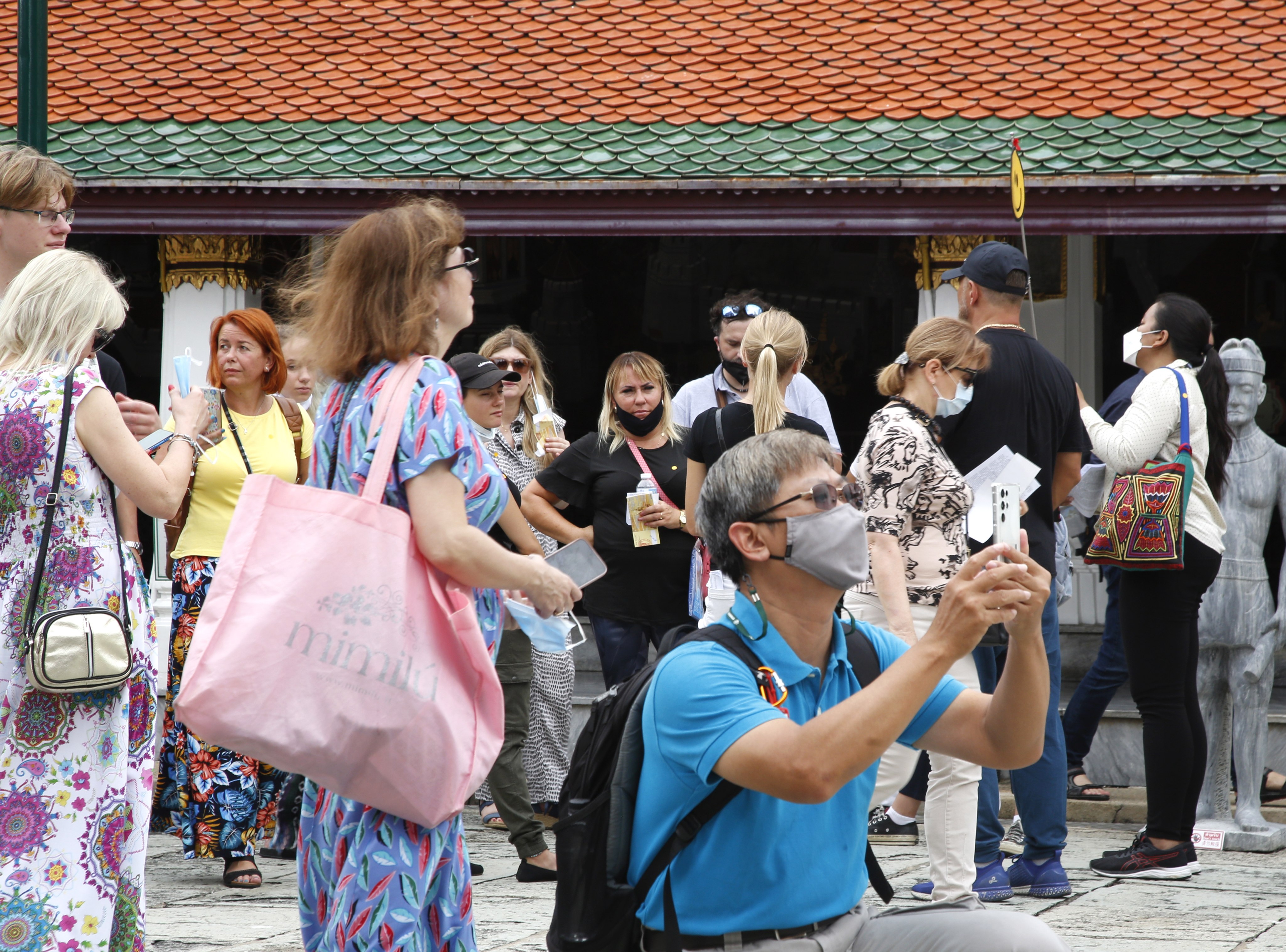 Tourists visit the Emerald Buddha Temple inside the Grand Palace in Bangkok, Thailand. Photo: EPA-EFE