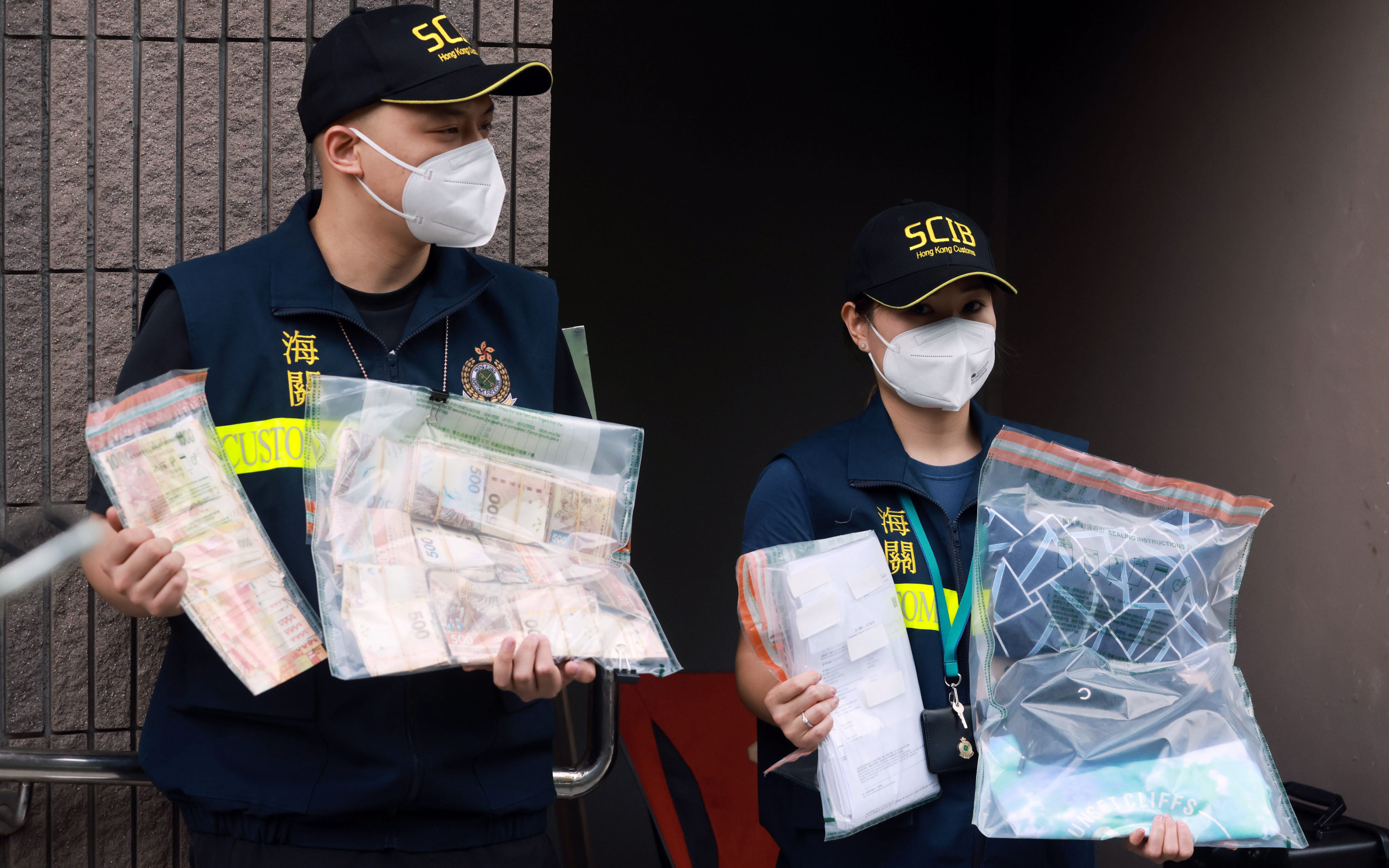 Evidence seized by customs officers as part of an investigation launched after thousands of Mark Six lottery tickets were impounded from a cargo ship in Hong Kong waters. Photo: May Tse.