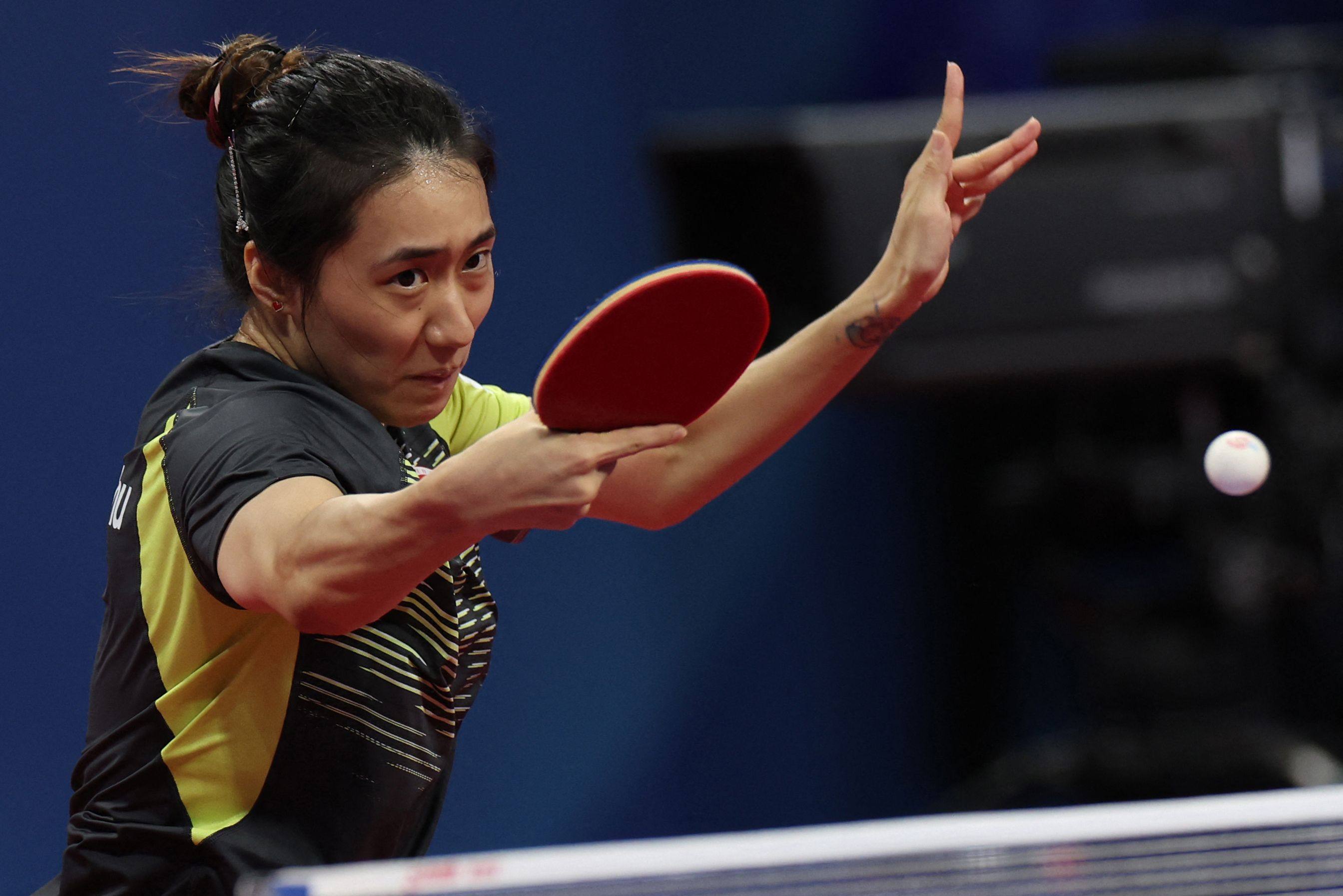Hong Kong’s Zhu Chengzhu on her way to victory over Giorgia Piccolin of Italy in Chengdu. Photo: AFP