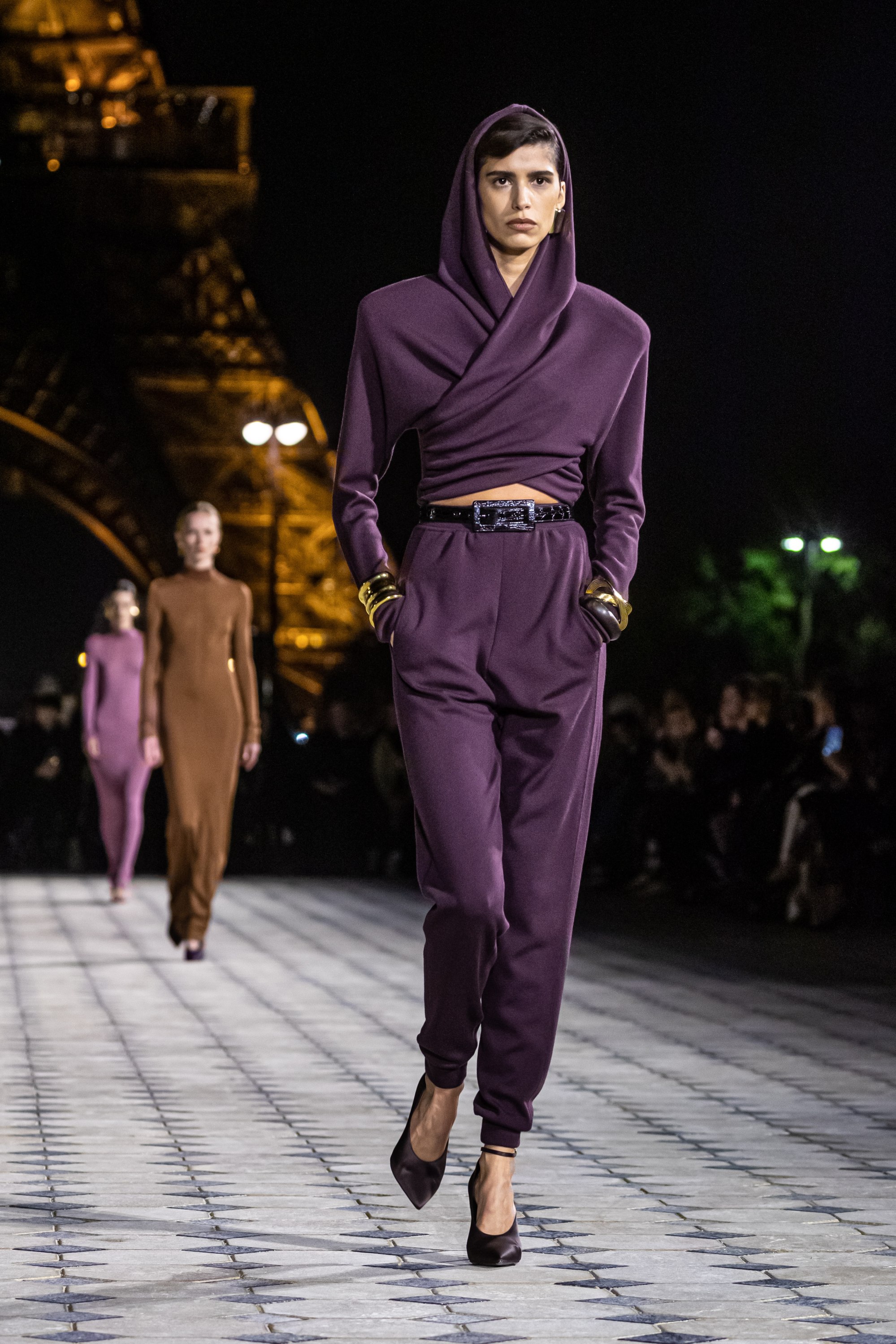 Yves Saint Laurent sends silky evening gowns down Eiffel Tower runway