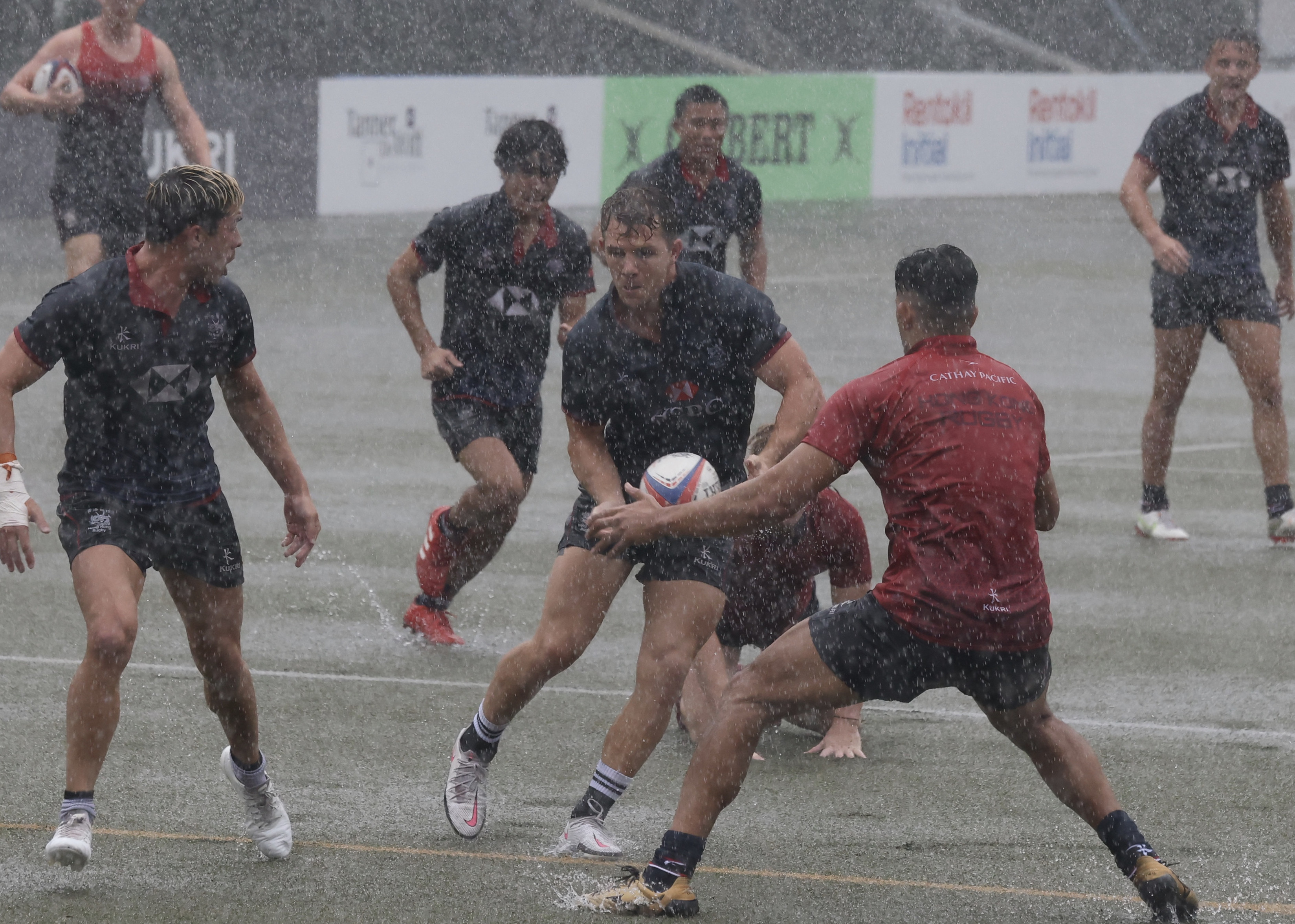 The Hong Kong men’s sevens squad was put through its paces during a soggy training session at King’s Park on Friday. Photo: Jonathan Wong