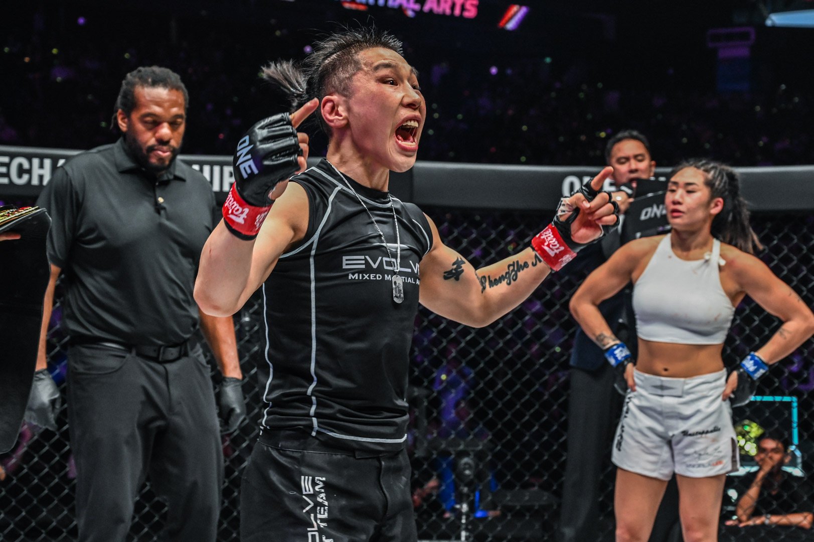 Xiong Jingnan celebrates as Angela Lee looks on dejectedly when the decision is read out at ONE on Prime Video 2. Photos: ONE Championship