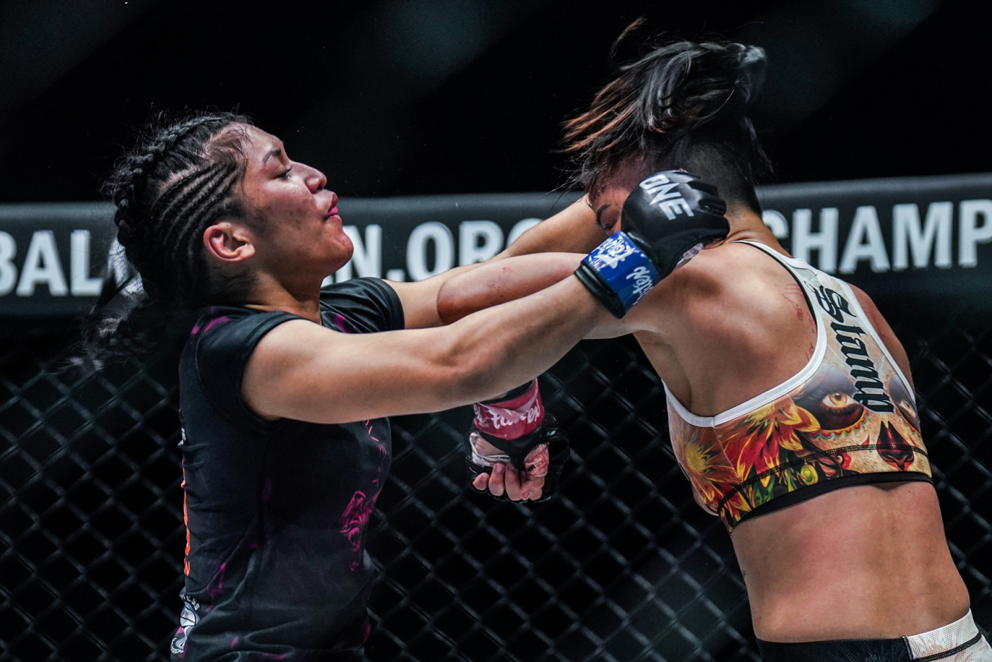 Thailand’s TSamp Fairtex drops Jihin Radzuan with an elbow at ONE on Prime Video 2.