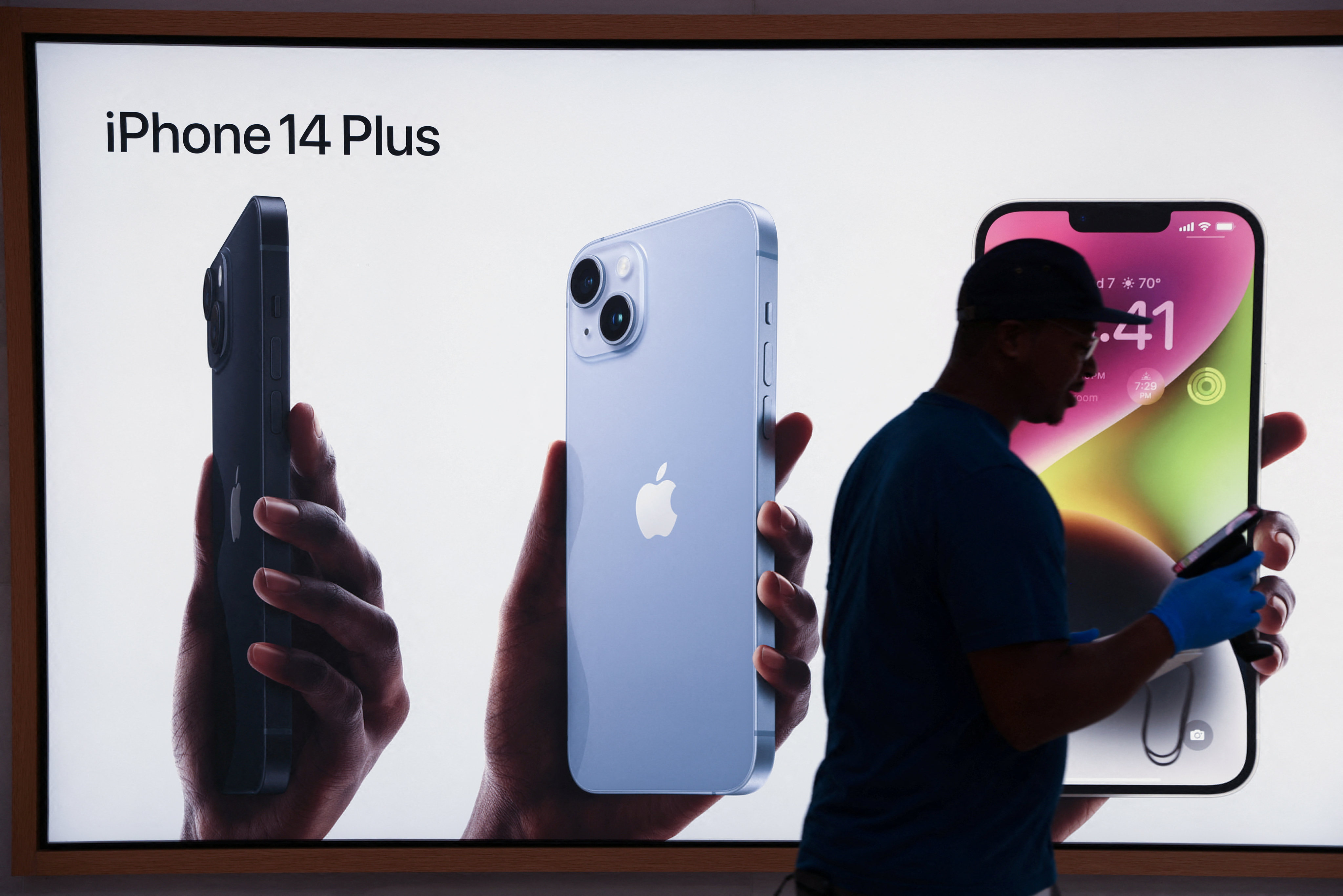 Apple’s iPhone 14 signage is seen at the the company’s Fifth Avenue store in New York City on September 16, 2022. Photo: Reuters