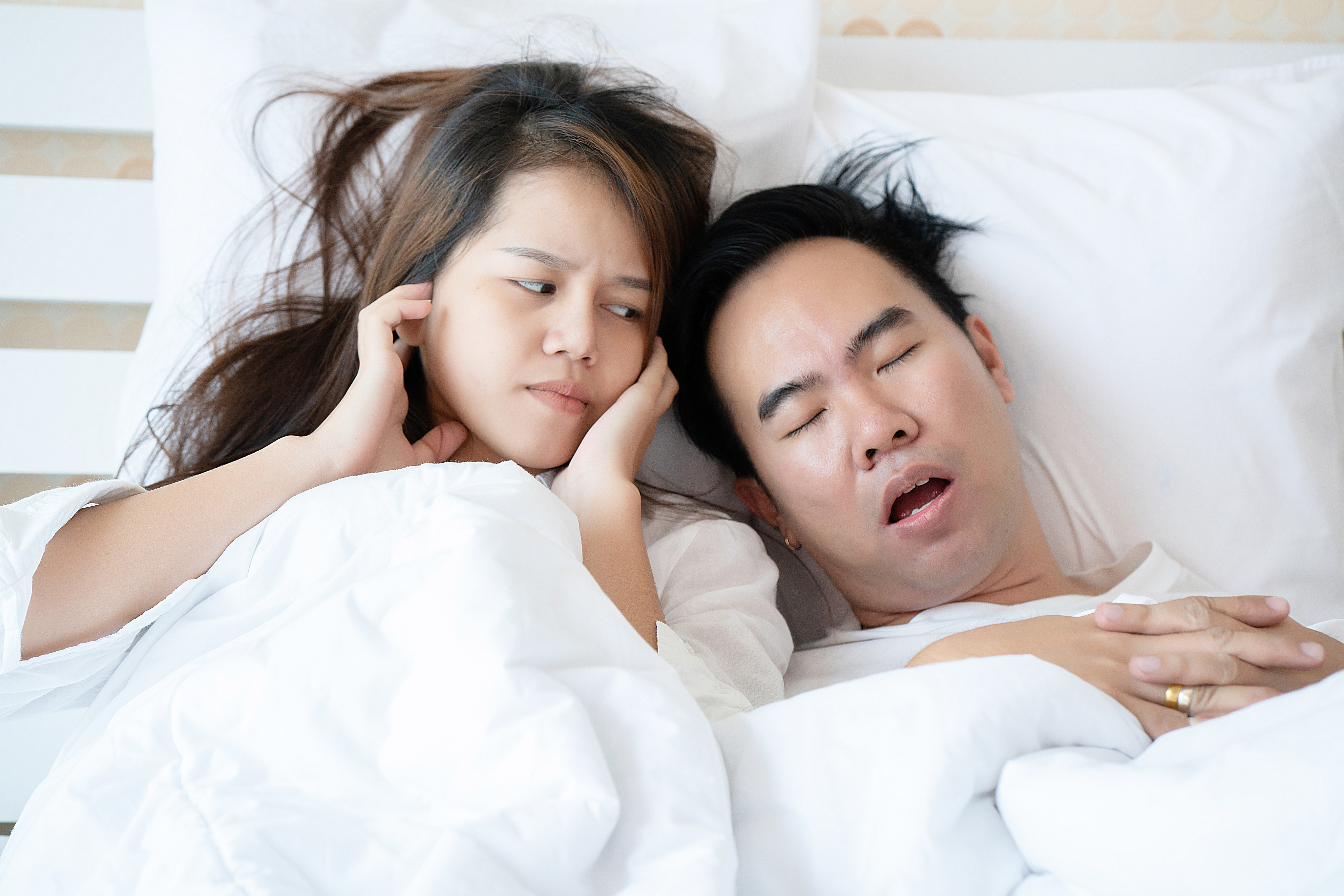 Obstructive sleep apnea, or OSA, is a potentially dangerous condition that should be taken seriously, a doctor says. Among the most common warning signs is persistent loud snoring. Photo: Shutterstock