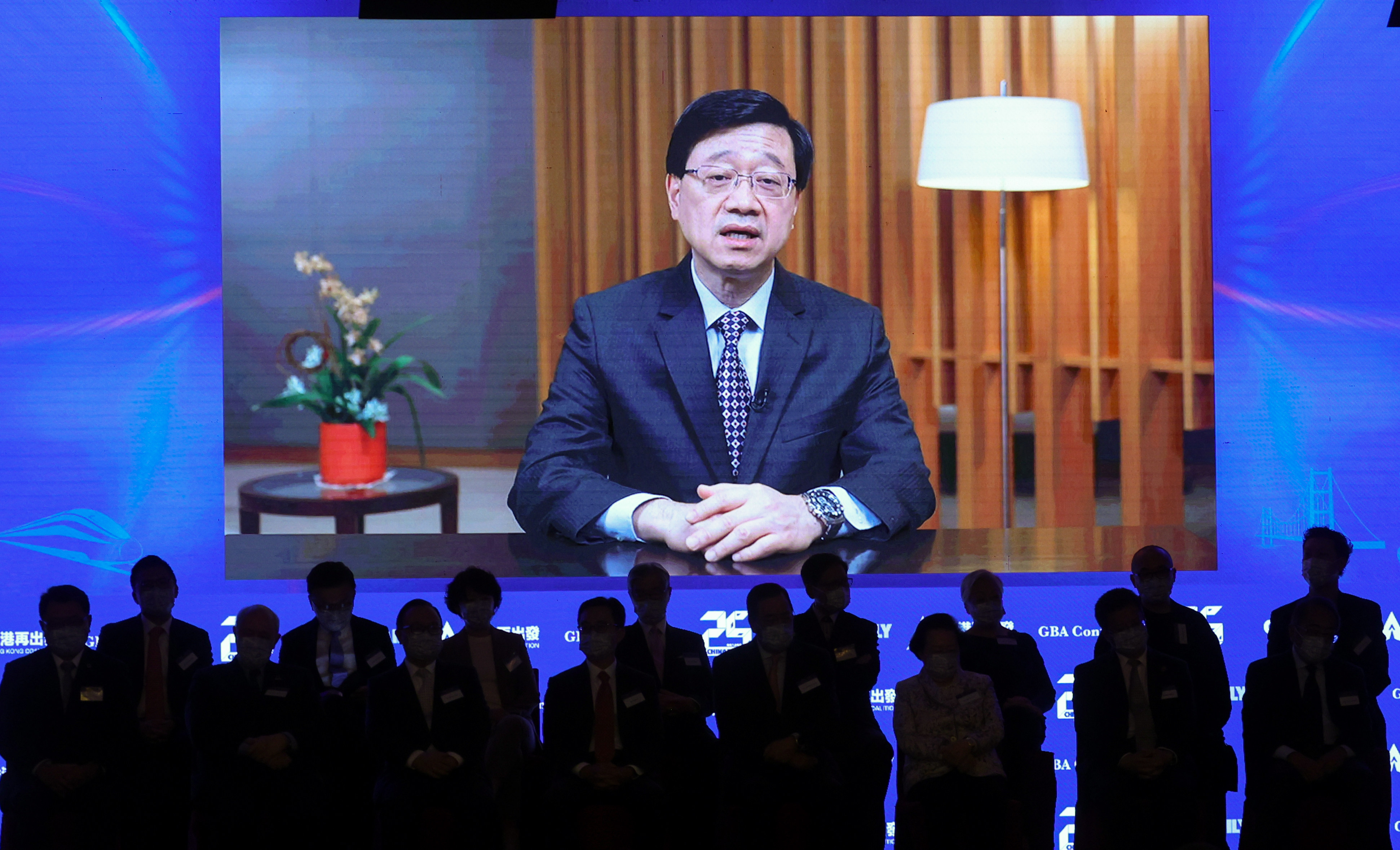Chief Executive John Lee appears on TV as he delivers the keynote address to the Greater Bay Area Forum at the Grand Hyatt in Wan Chai, Hong Kong, on October 6. Photo: Yik Yeung -man