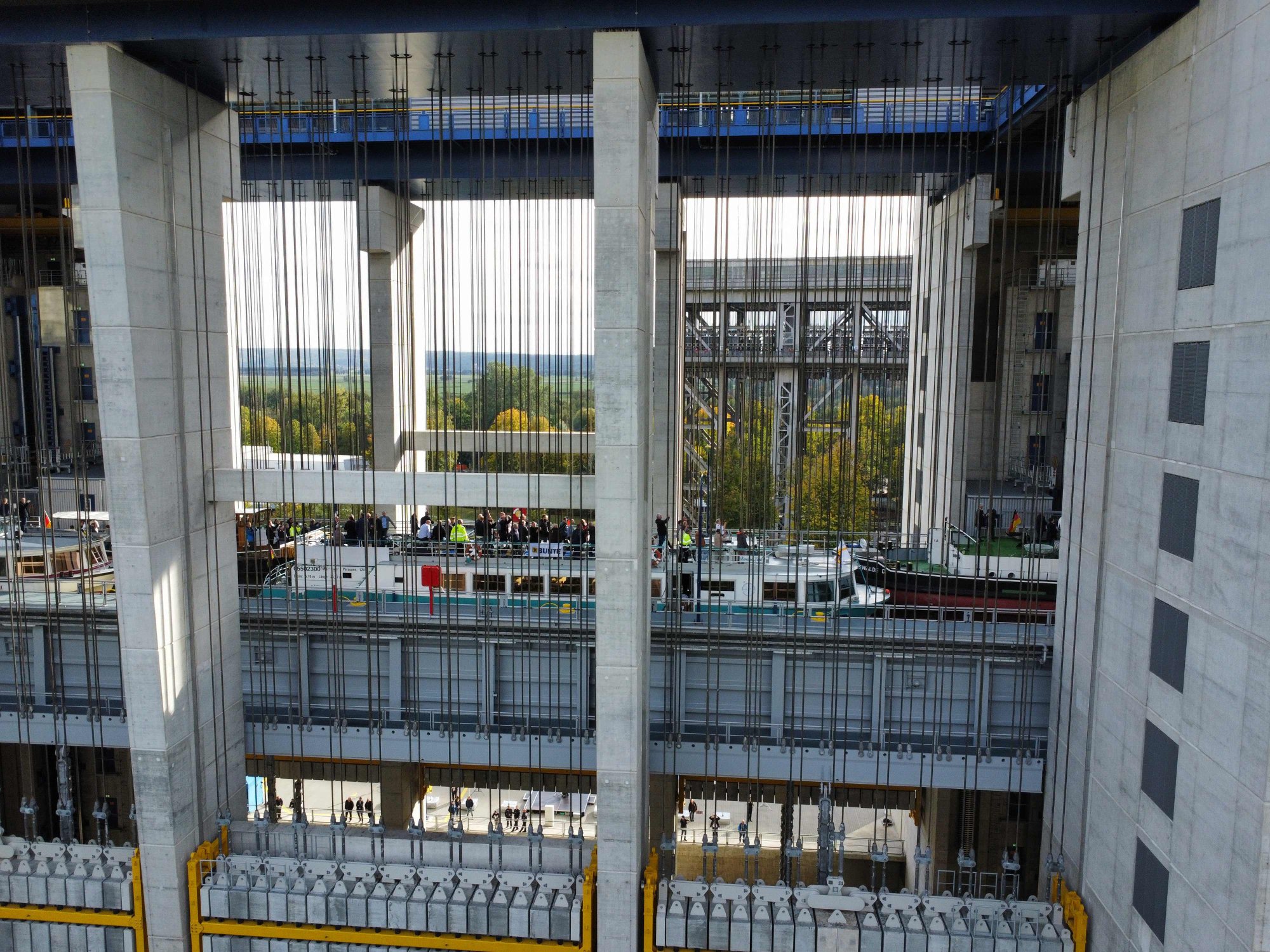 The first boats get hoisted up by the new lift. Photo: AFP