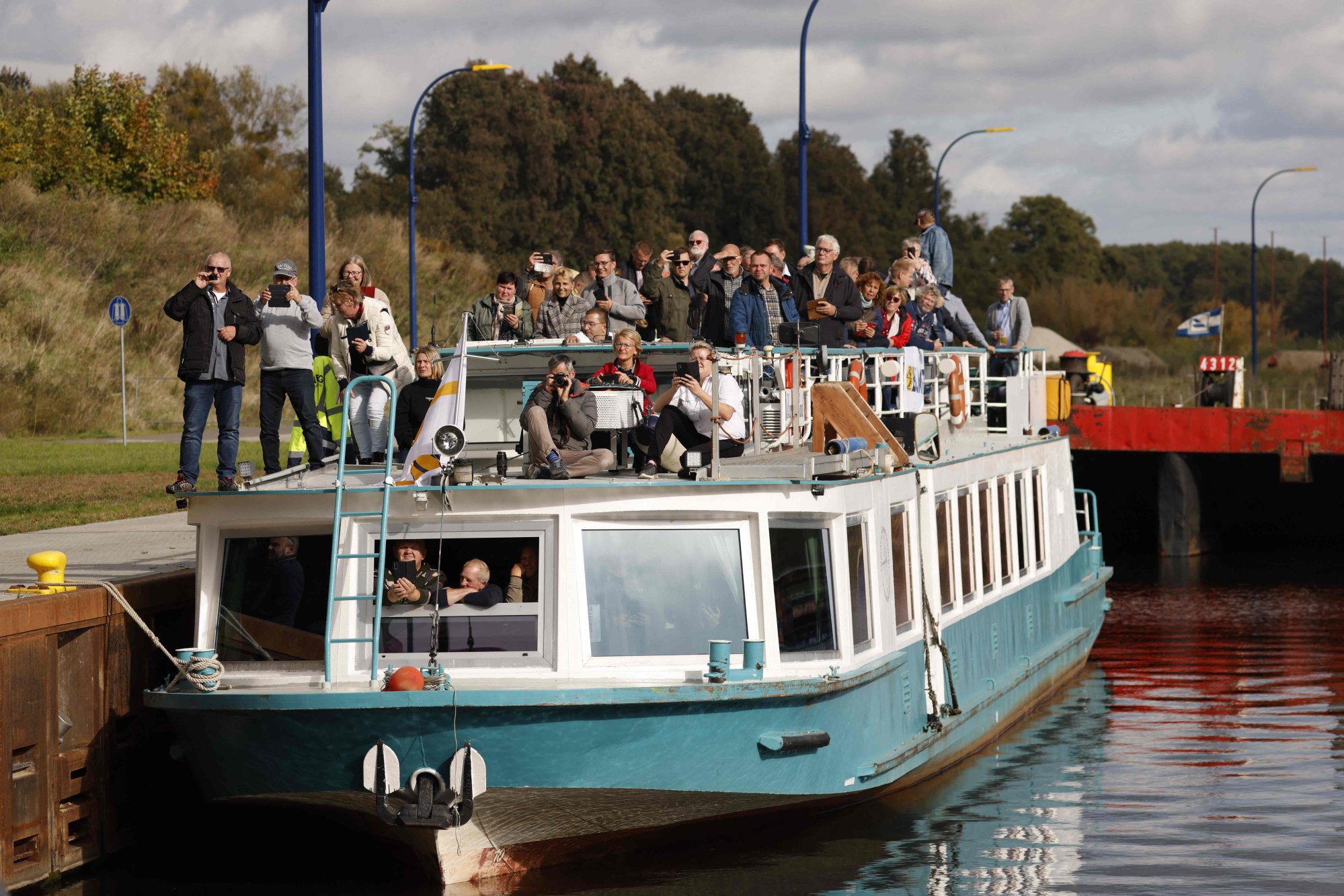 People view the lift’s inauguration from a boat on the Oder-Havel Canal. Photo: AFP