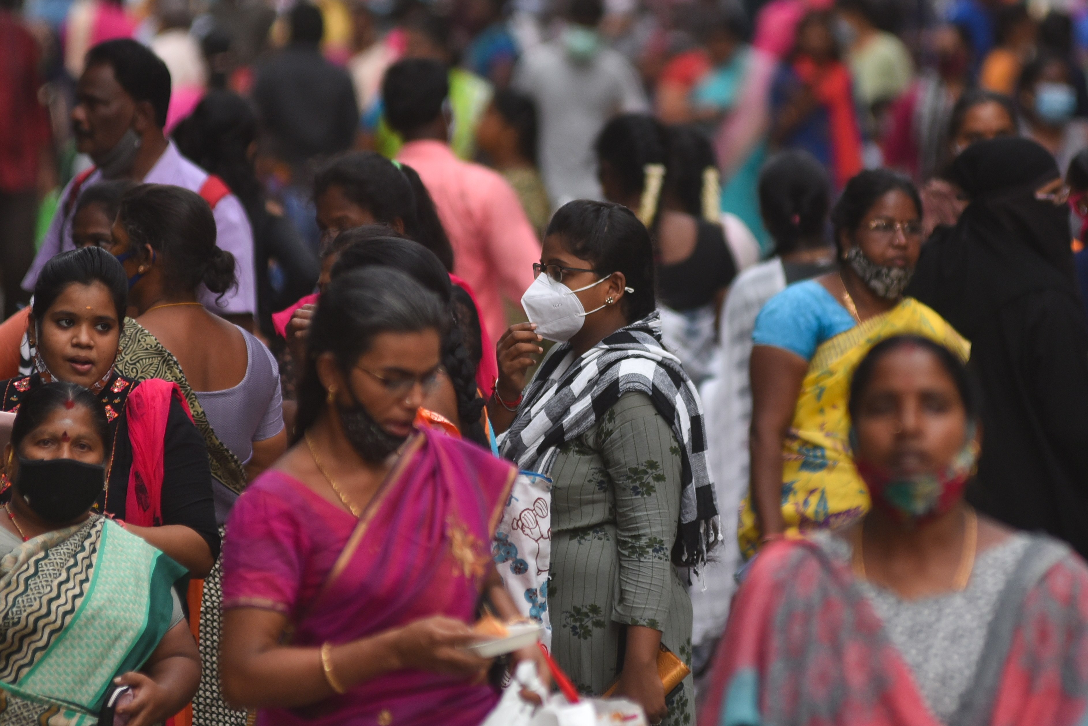 People at crowded market area in Chennai, India. File photo: EPA-EFE