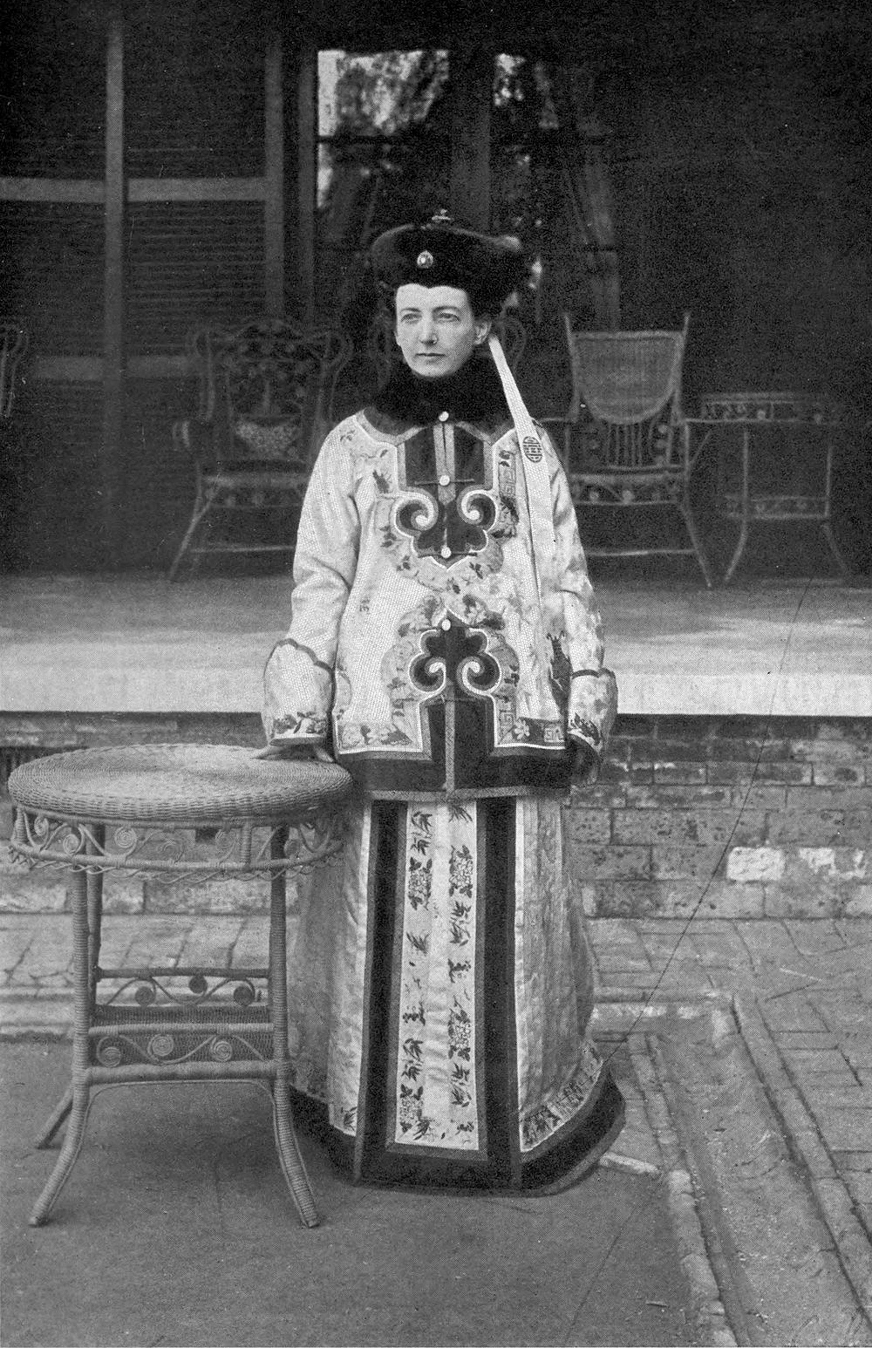 Katharine Carl dressed in Chinese robes in 1905.