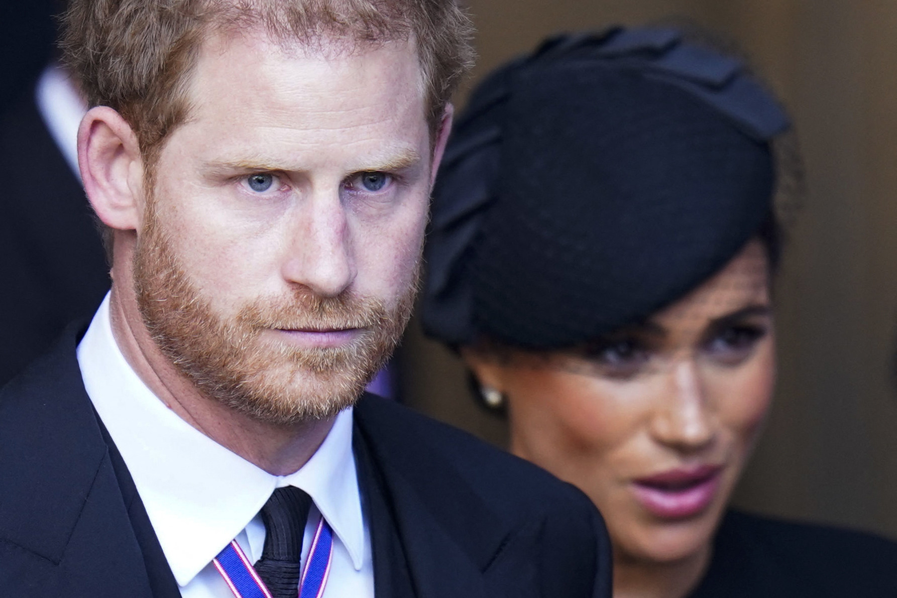 Britain’s Prince Harry and Meghan, Duchess of Sussex, leave after a service for the reception of Queen Elizabeth’s coffin at Westminster Hall in September. Photo: AFP