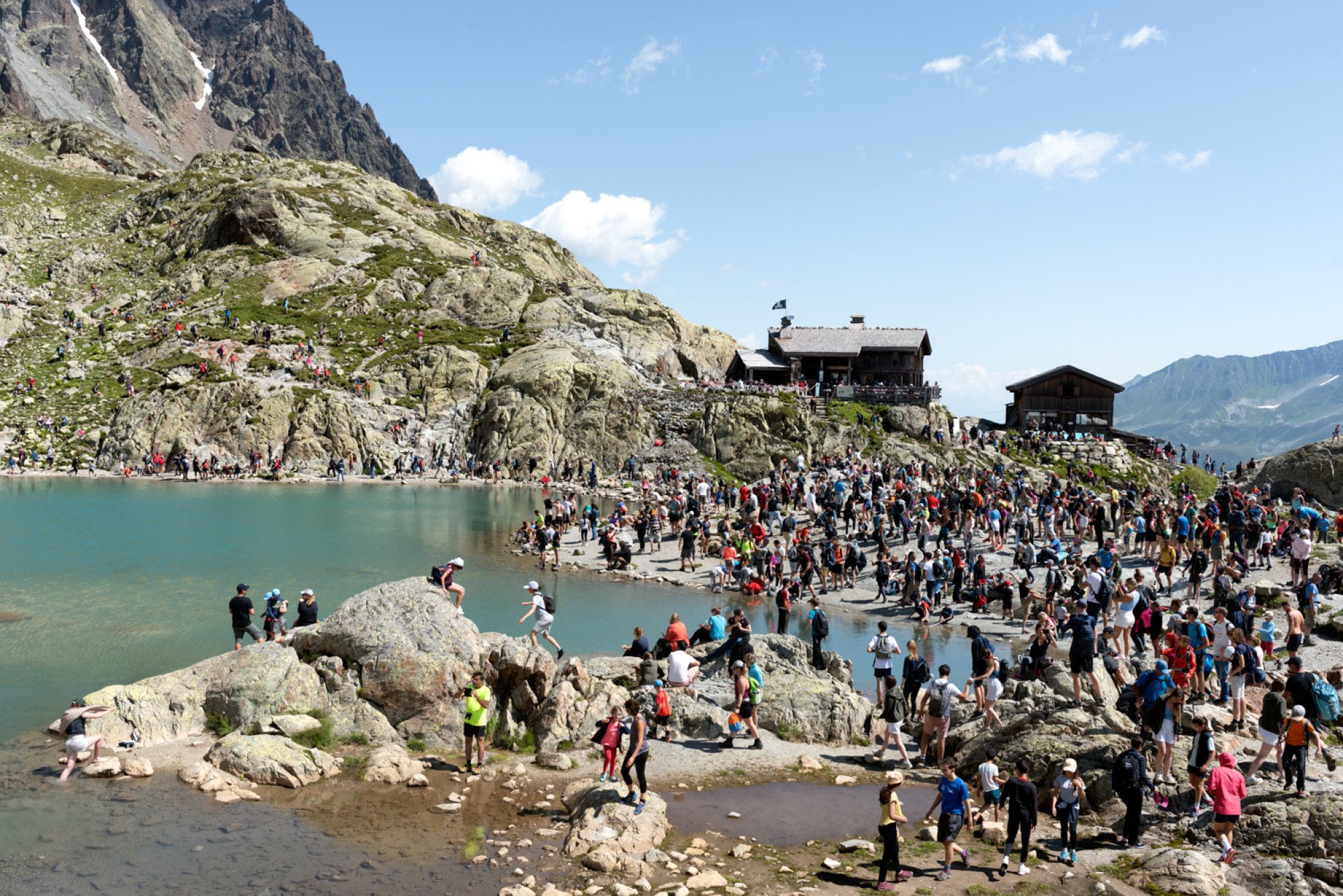 This montage, photographed at Lac Blanc in Chamonix, France, over a period of about an hour, provides a snapshot of the footfall that contrasts with the images of untamed and empty nature found on Instagram under the hashtag #lacblanc. Photo: Natacha de Mahieu