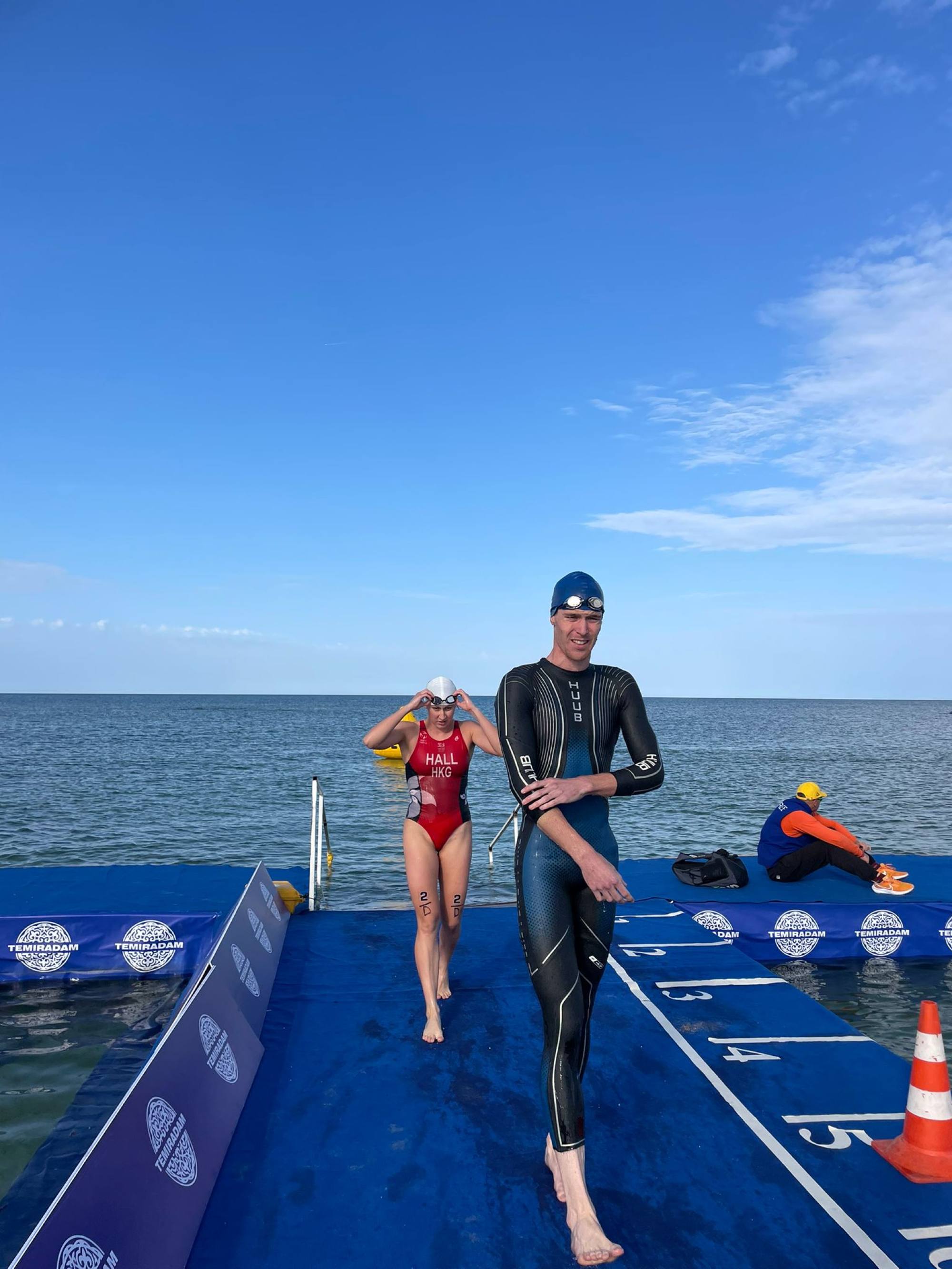 Oscar Coggins and Charlotte Hall were members of the mixed relay team that won silver at the Asia Triathlon Championships.