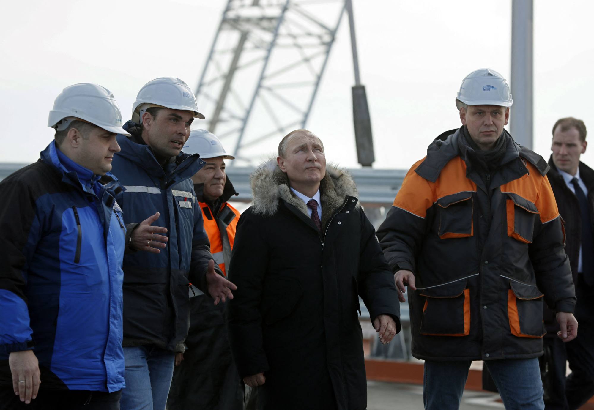 Russian President Vladimir Putin (centre) inspects the road section of the Crimean bridge over the Kerch Strait. File photo: AFP