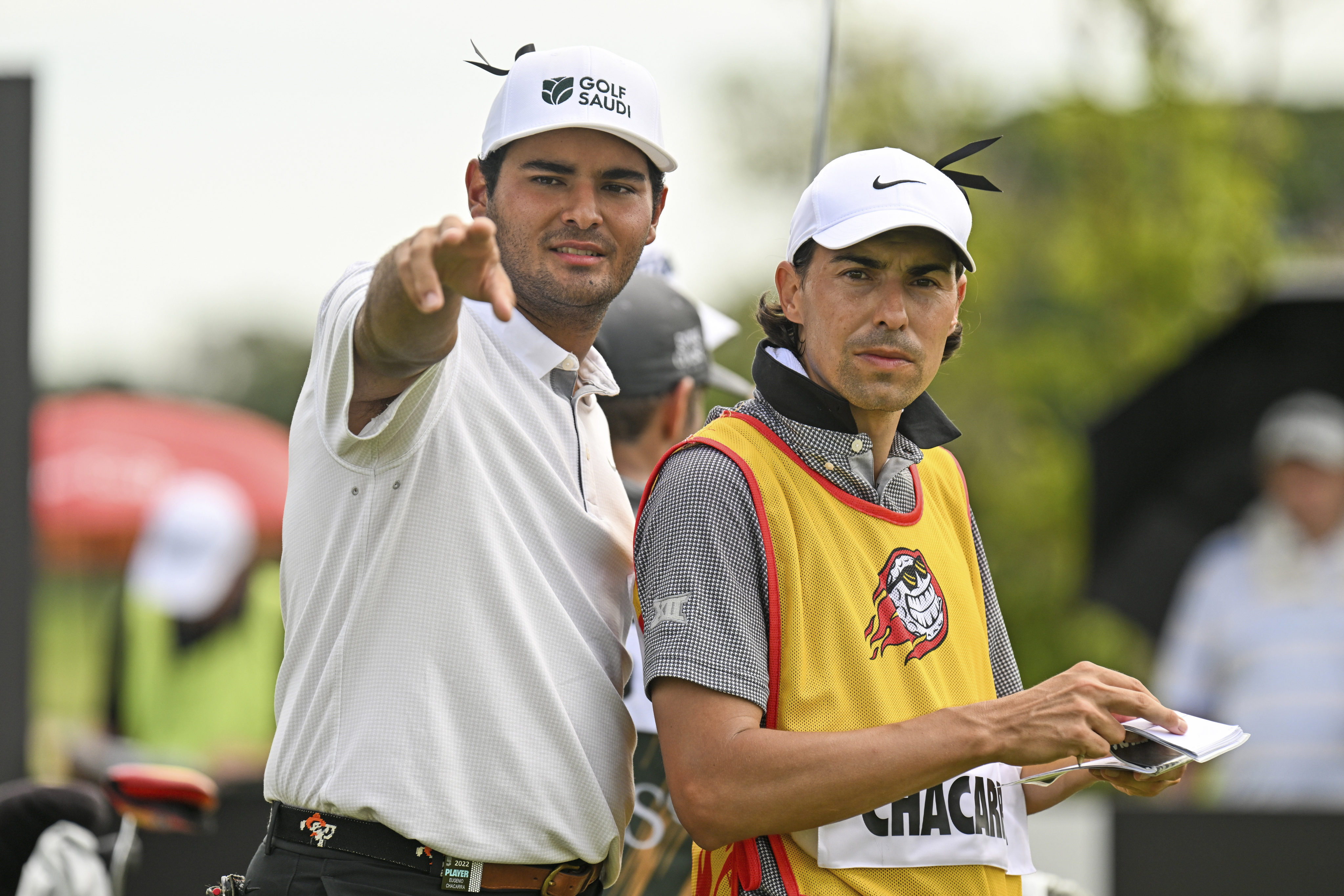 Eugenio Lopez-Chacarra from Spain gestures with his caddy on the 11th hole during the LIV Golf Invitational Bangkok at Stonehill Golf Club in Pathum Thani, Thailand.Photo: AP