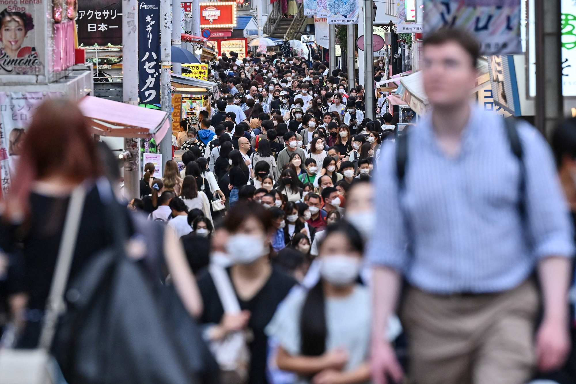 People in the popular Harajuku area of Tokyo on September 23. Photo: AFP