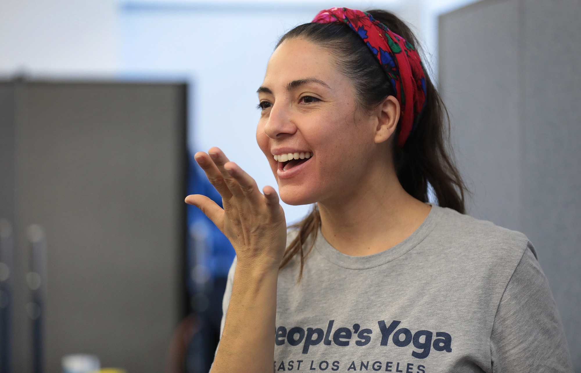 Leah Rose Gallegos teaches a breathing exercise at Accelerated Charter Elementary School. Photo: TNS