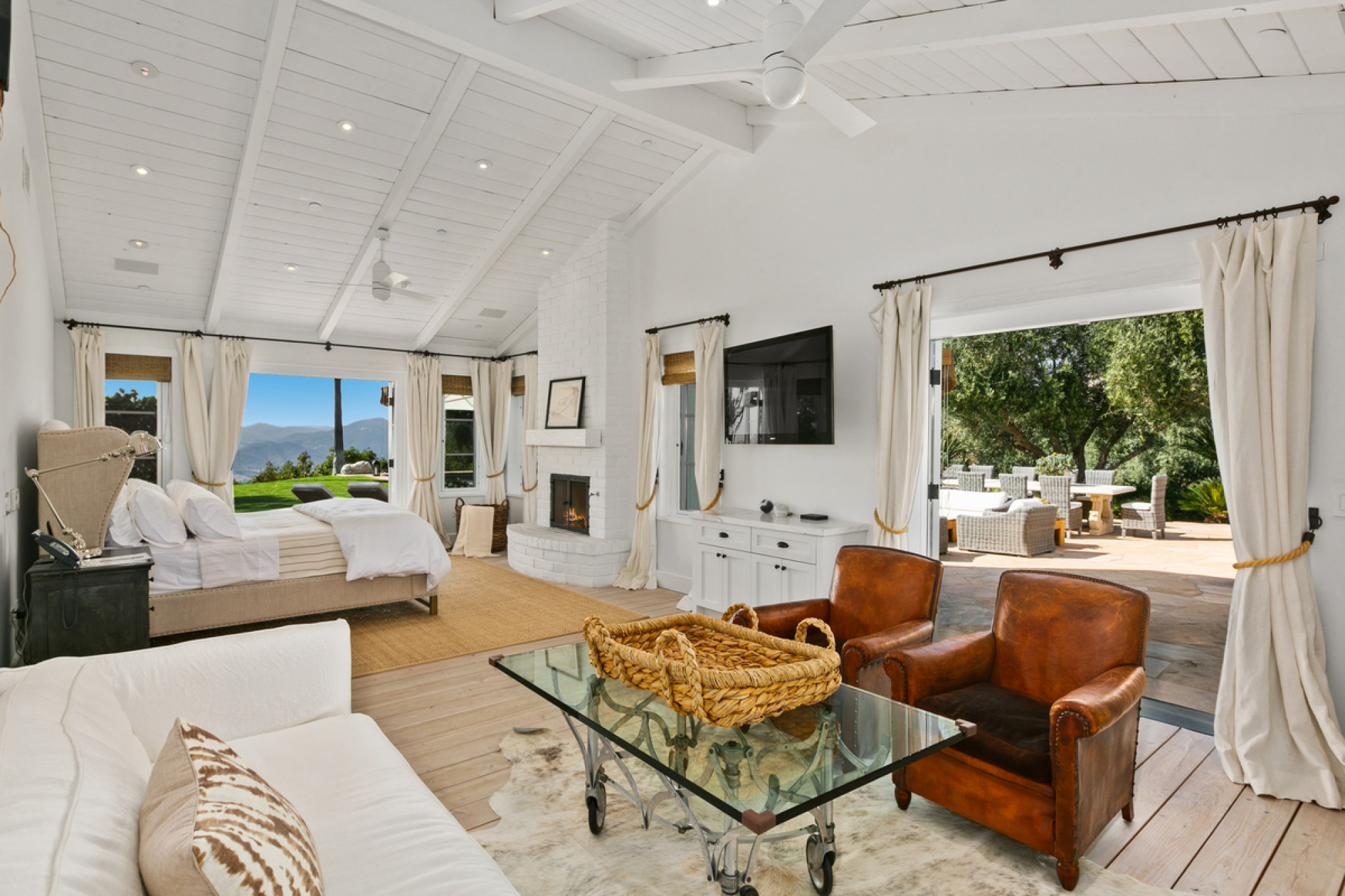 The primary suite of Sandra Bullock’s compound comes with its own fireplace, lounge area and direct access to the pool. Photo: ZenHouse Collective