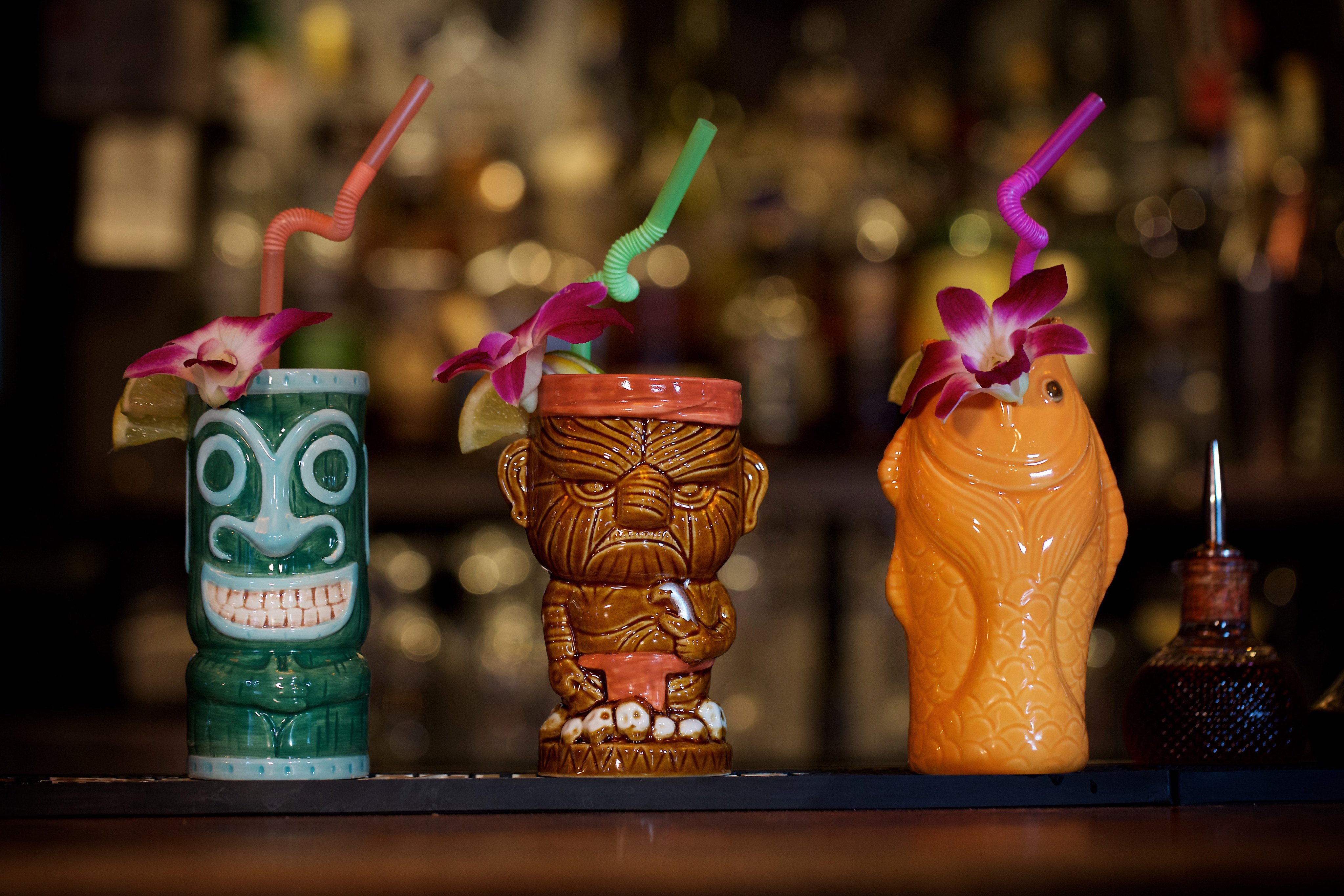 Typical Polynesian god-themed drink cups at a tiki bar in Washington DC in the US. Originating in the 1930s, tiki bars are intended as an exotic escape, but is it now time to do away with their culturally appropriated iconography and rebrand them as ‘tropical’? Photo: Getty Images