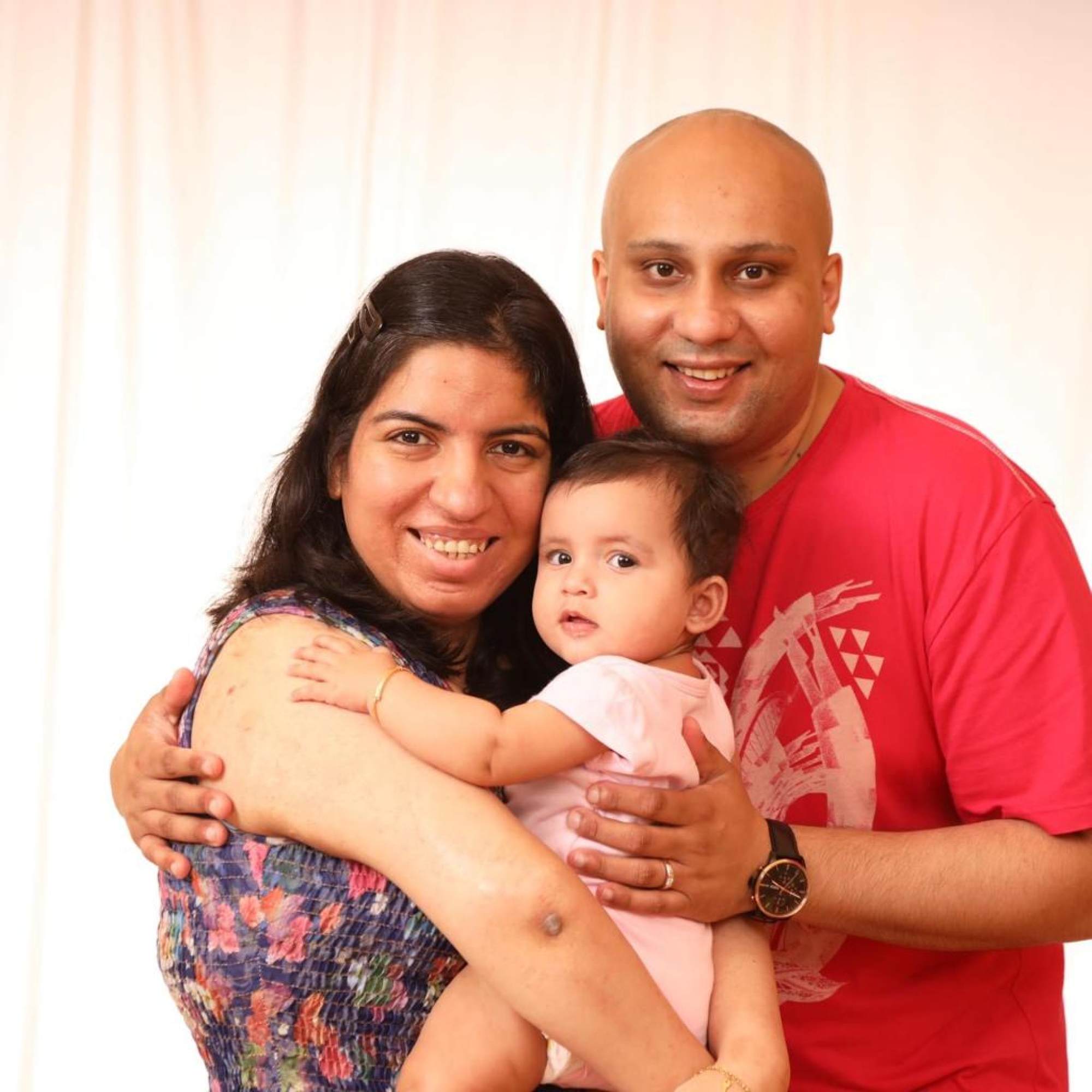 Julie Aswani with her husband and daughter. Photo: courtesy of Julie Aswani