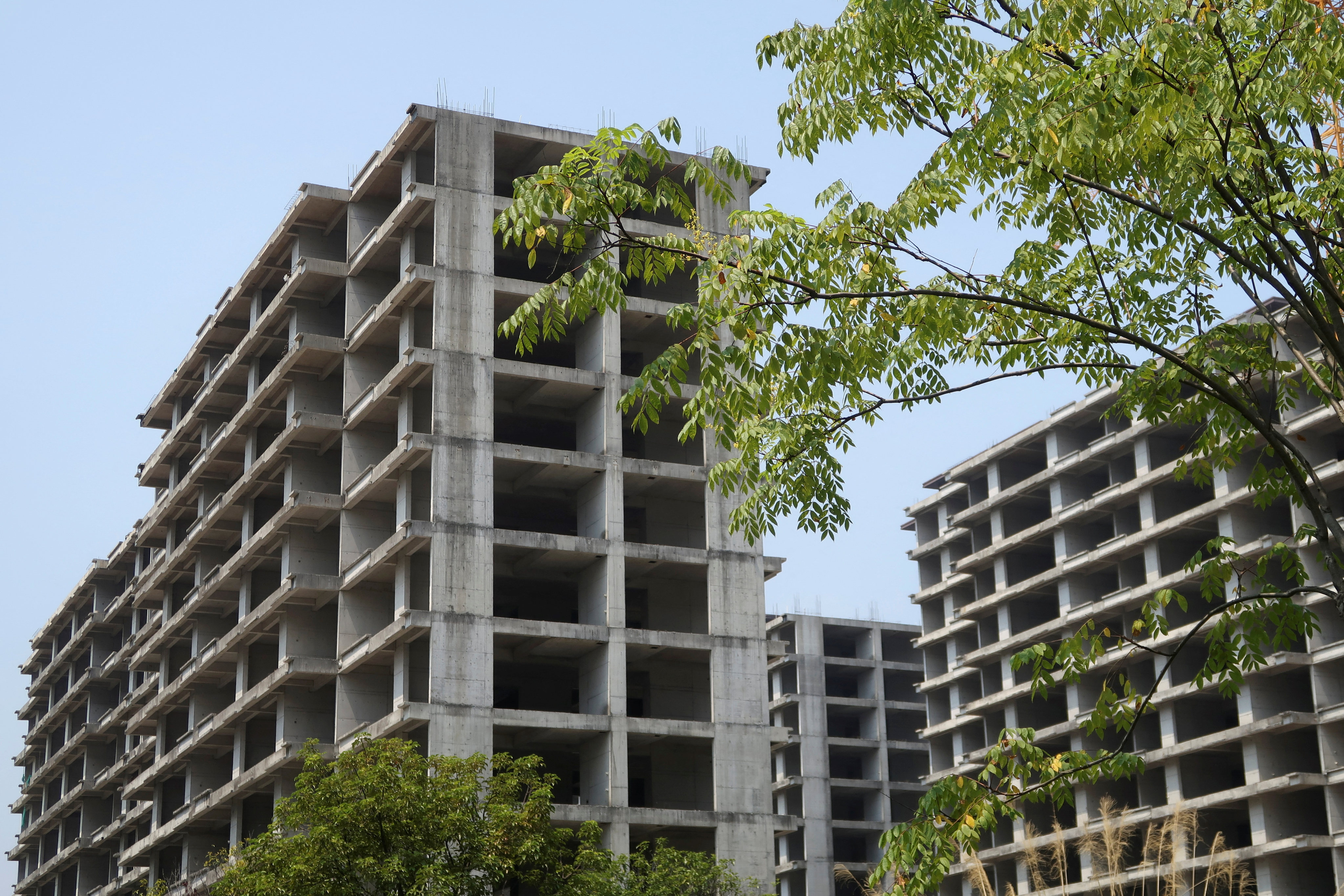 Unfinished blocks of flats stand at a residential complex in Guilin, Guangxi Zhuang autonomous region, on September 17. The struggles of China’s property market are reminiscent of the woes that plagued its US counterpart before the 2007-08 global financial crisis. Photo: Reuters