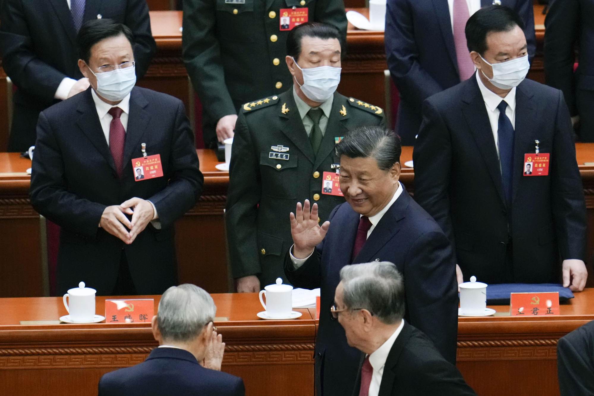 President Xi Jinping waves to delegates at the Great Hall of the People in Beijing on the first day of the 20th party congress. Photo: Kyodo