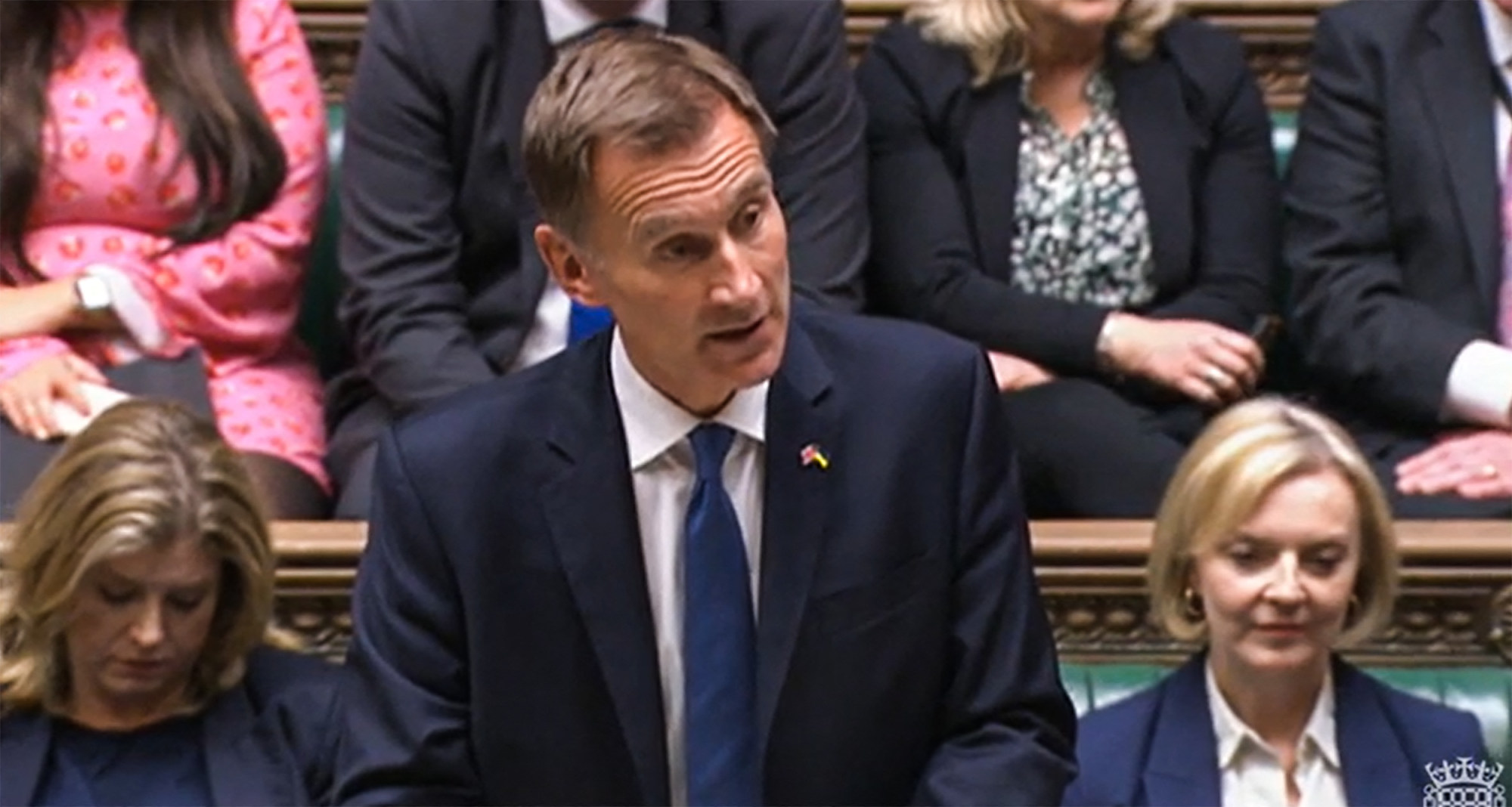Britain’s Chancellor of the Exchequer Jeremy Hunt announcing tax and spending measures. Photo: AFP