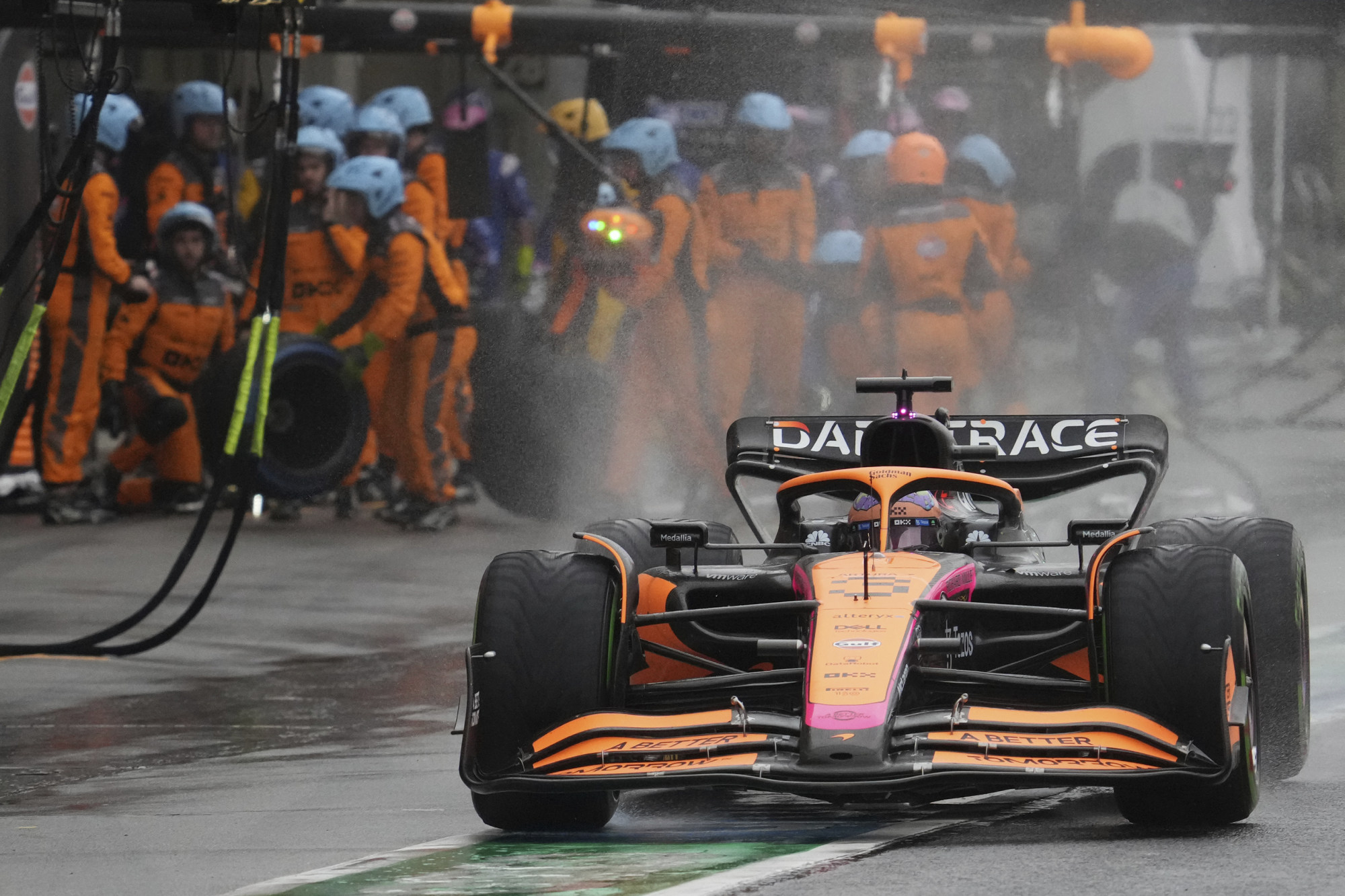 McLaren driver Daniel Ricciardo of Australia powers his car out of the pits during the Japanese Grand Prix. Photo: AP
