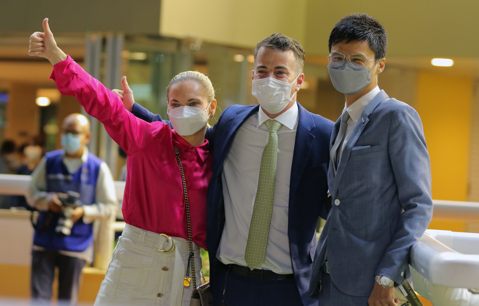 Four-time New Zealand champion trainer Jamie Richards (centre) celebrates his first Hong Kong win with his partner, Danielle Johnson (left), and his assistant, Jones Ma Po-chung (right), following Handsome Rebel’s victory last week.