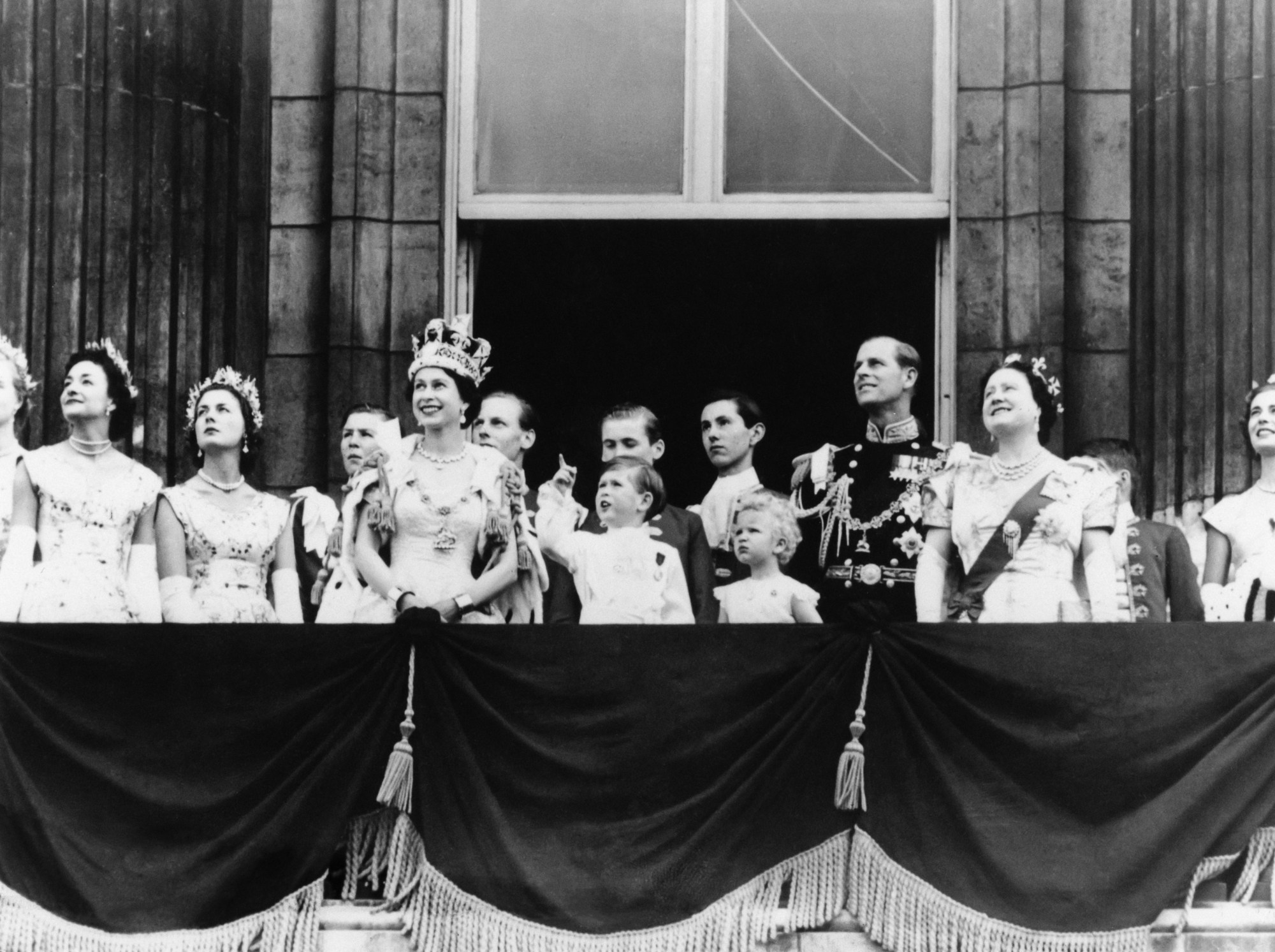 Queen Elizabeth and members of the royal family at the queen’s coronation ceremony over half a century ago in London. Photo: Getty Images