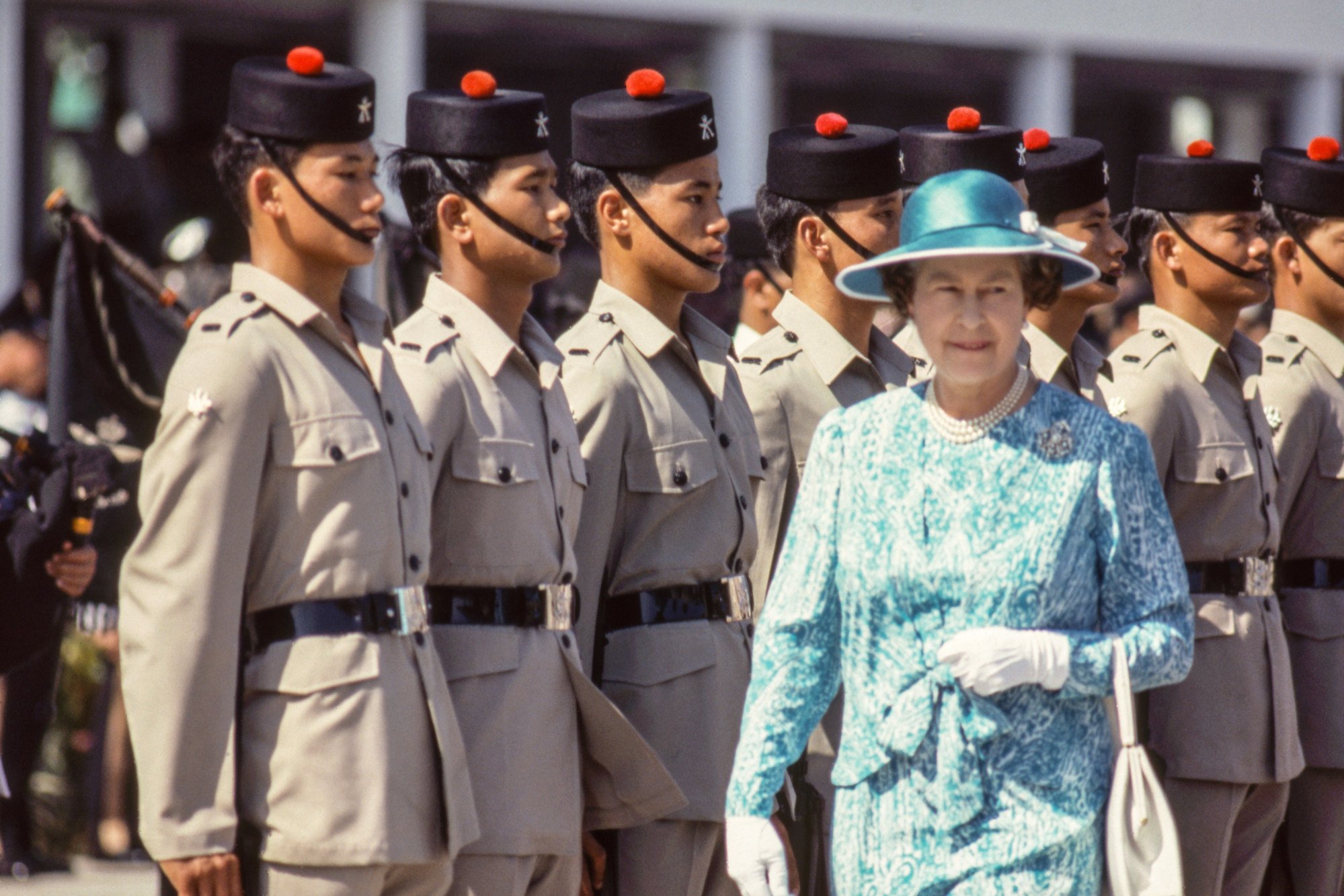 Queen Elizabeth inspects the Royal Gurkha Rifles in Central, Hong Kong, in 1986. Photo: Howard Walker