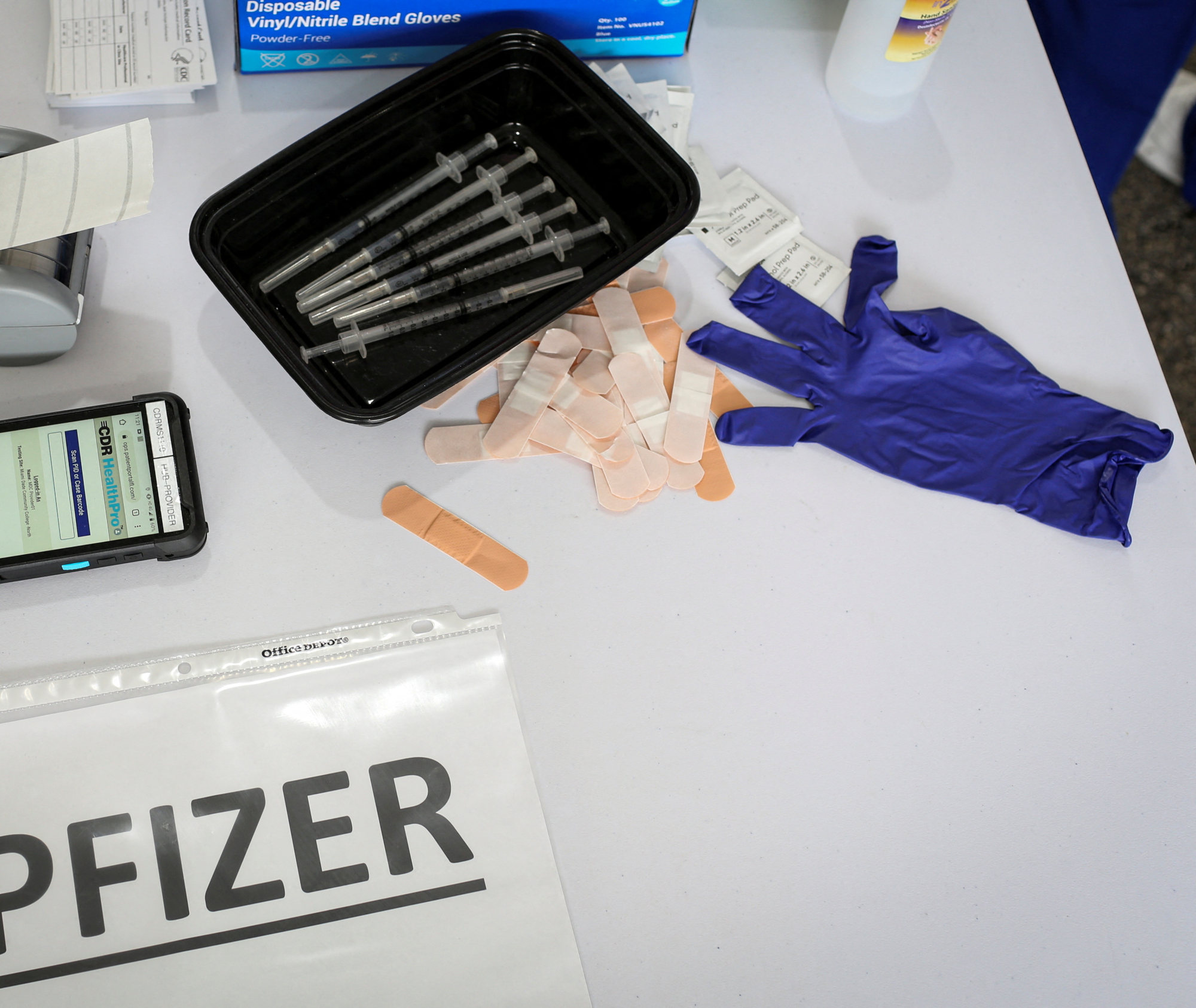 Vaccine doses and boosters are still important in the fight against Covid-19. Photo: Reuters