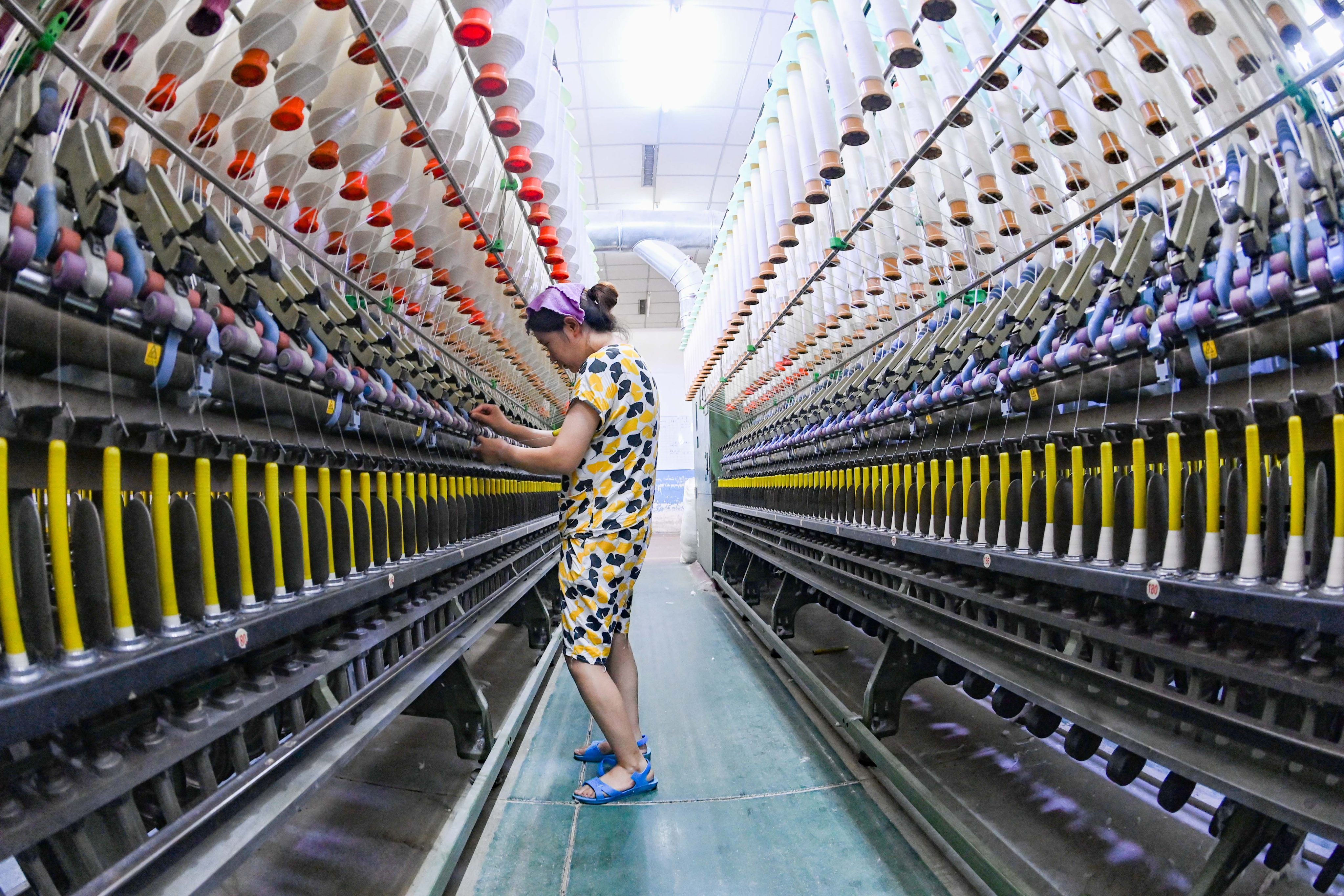 China has several economic-development zones, including in Shandong province where this textile enterprise operates, and they have long served to bolster foreign direct investment in the country. Photo: Getty Images
